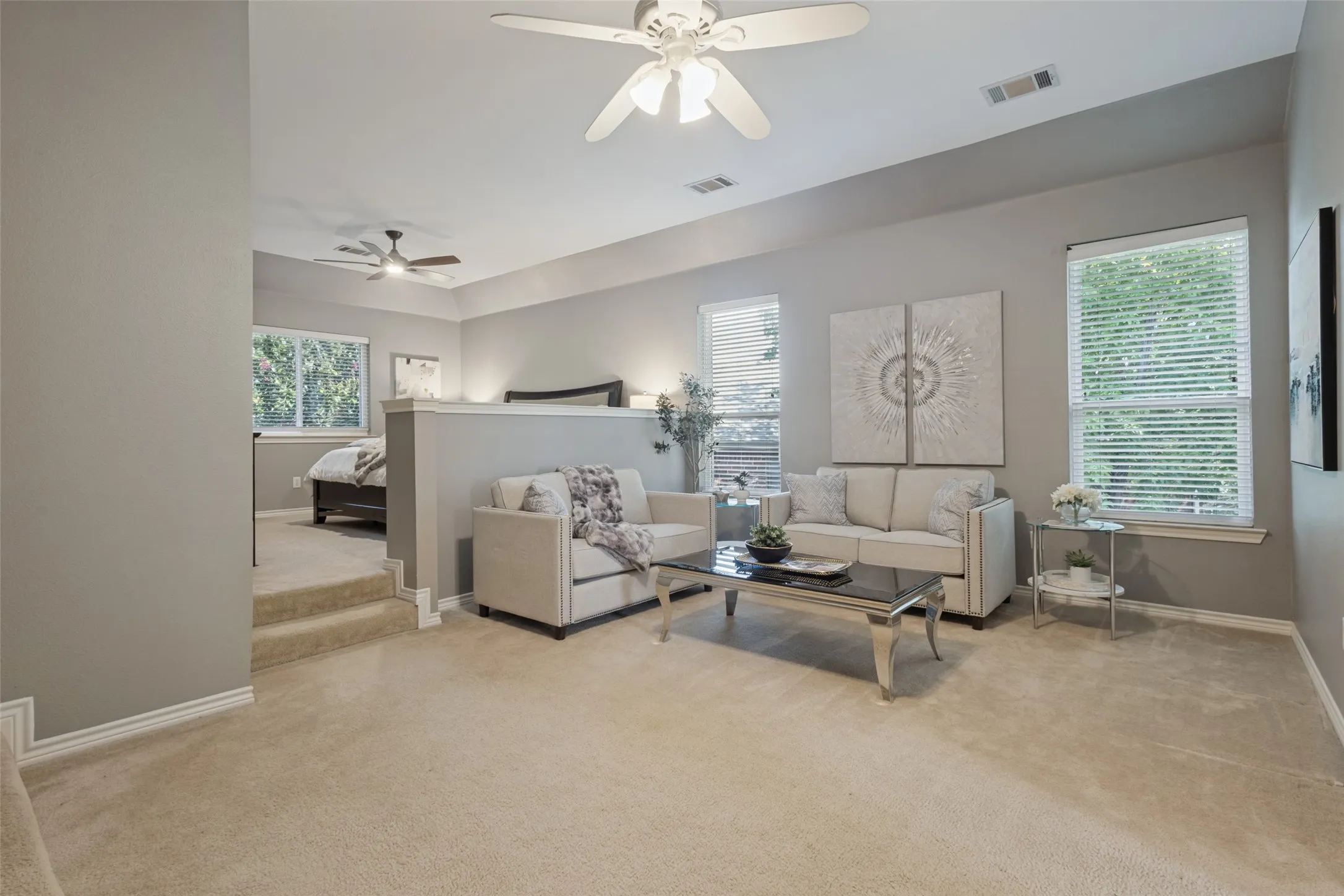 This is a full sitting area in the primary suite, A place to go and do a little adulting.