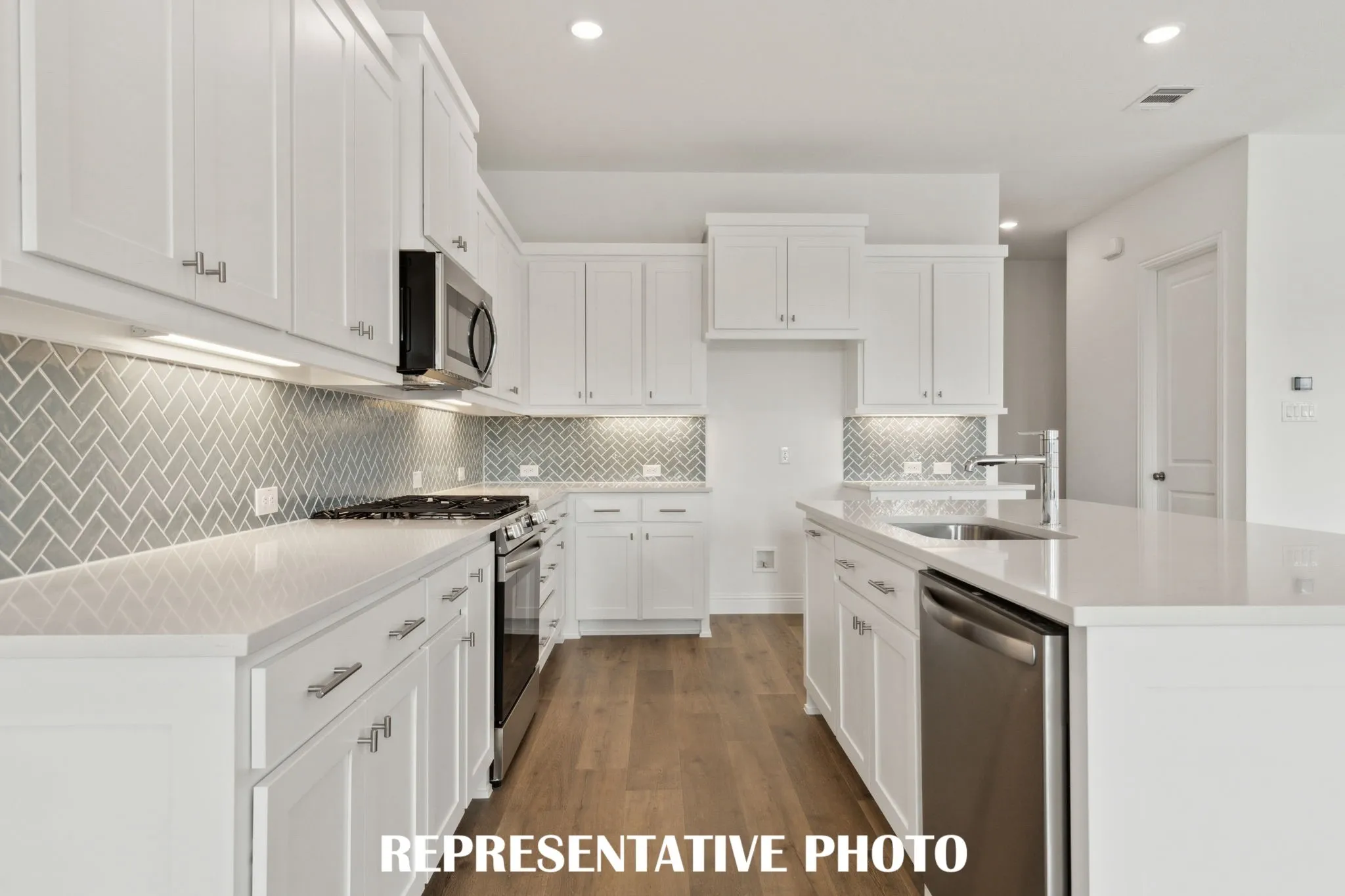 With outstanding storage and prep space, this dream kitchen is the perfect place for your inner chef to create culinary masterpieces!  REPRESENTATIVE PHOTO