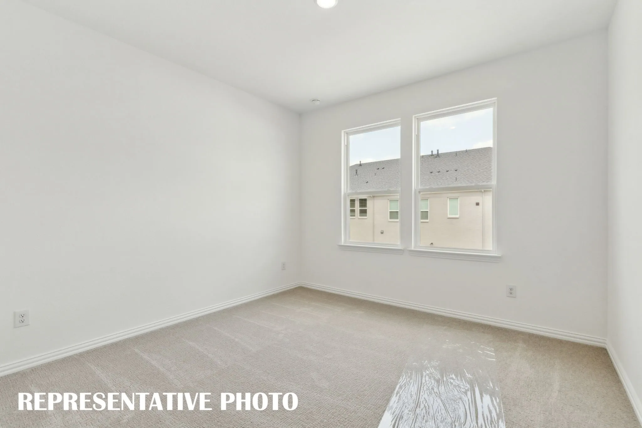 One of two nicely sized secondary bedrooms in our Justin plan.  REPRESENTATIVE PHOTO