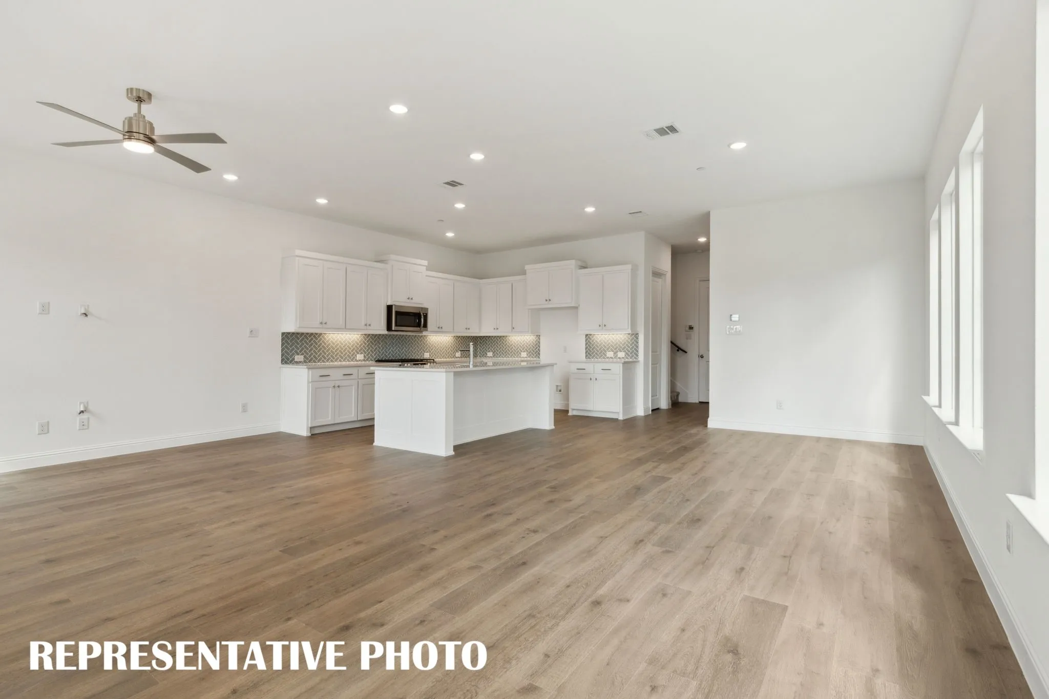 Open and flowing, our Justin floor plan was designed for entertaining!  REPRESENTATIVE PHOTO