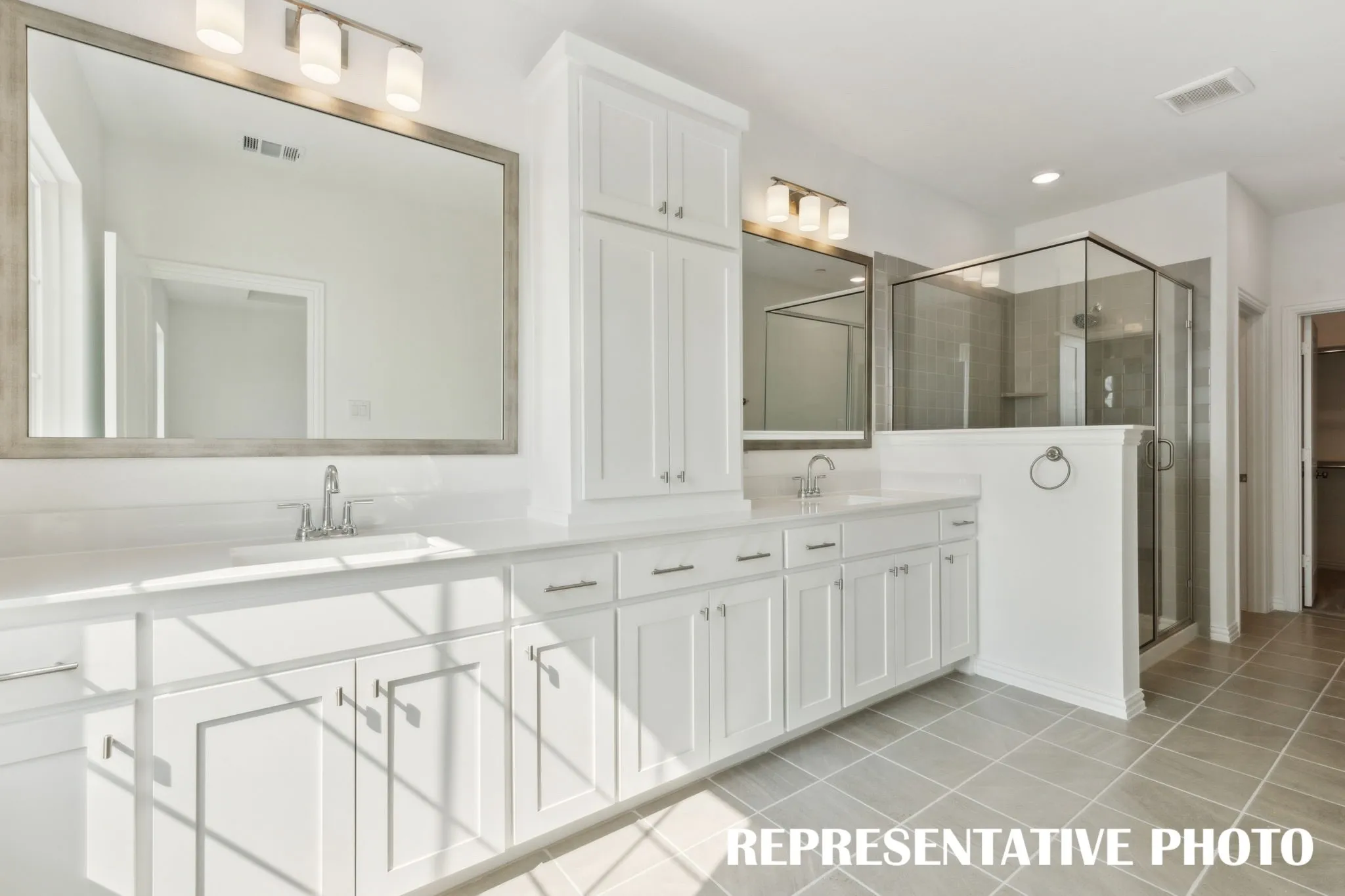 A beautiful owner's bath designed and built for two!  REPRESENTATIVE PHOTO