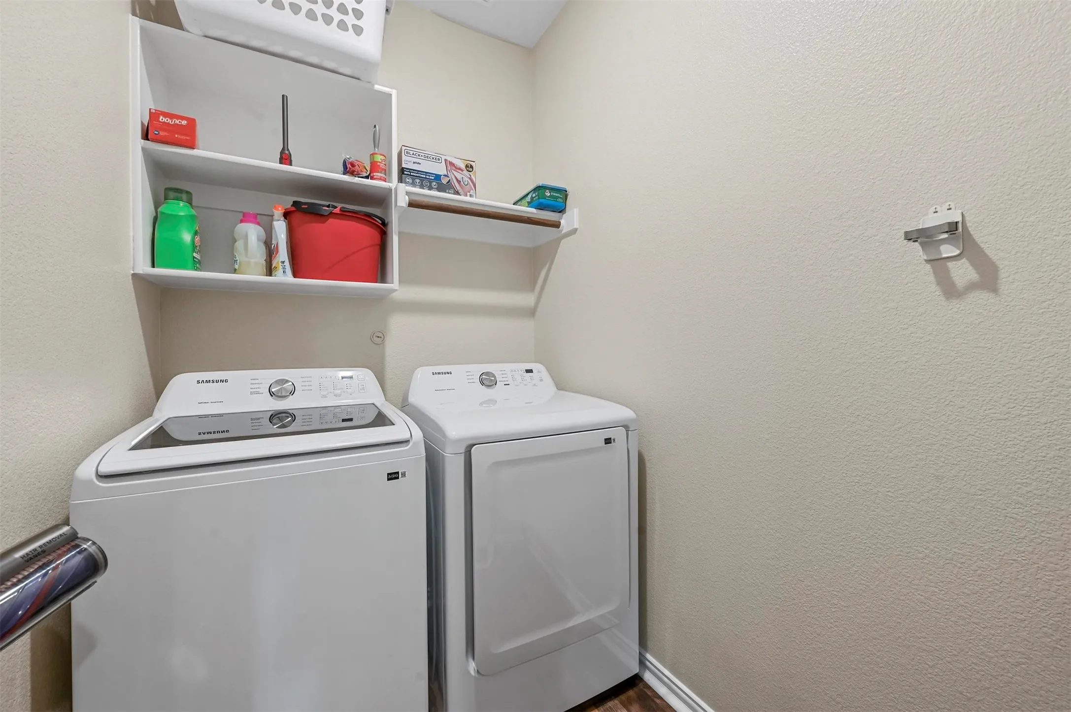 Clothes washing area with washing machine and dryer
