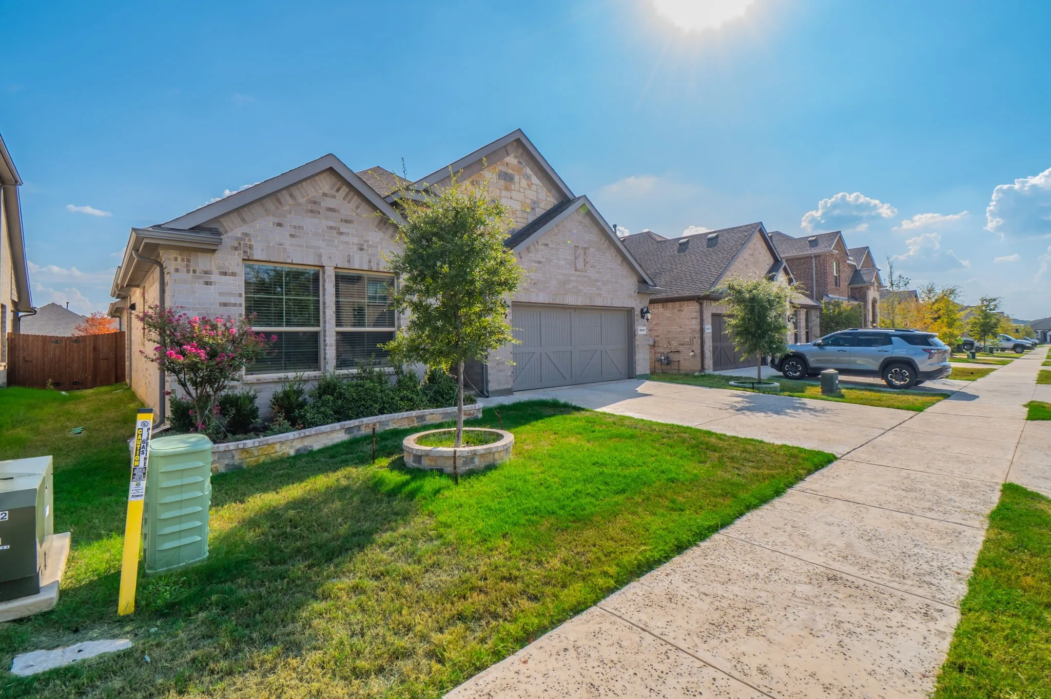 Brick and stone exterior with gabled roof lines
