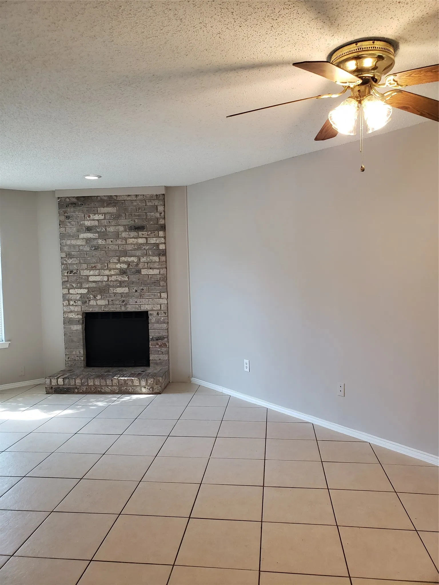 808 - Dining area with ceiling fan above.