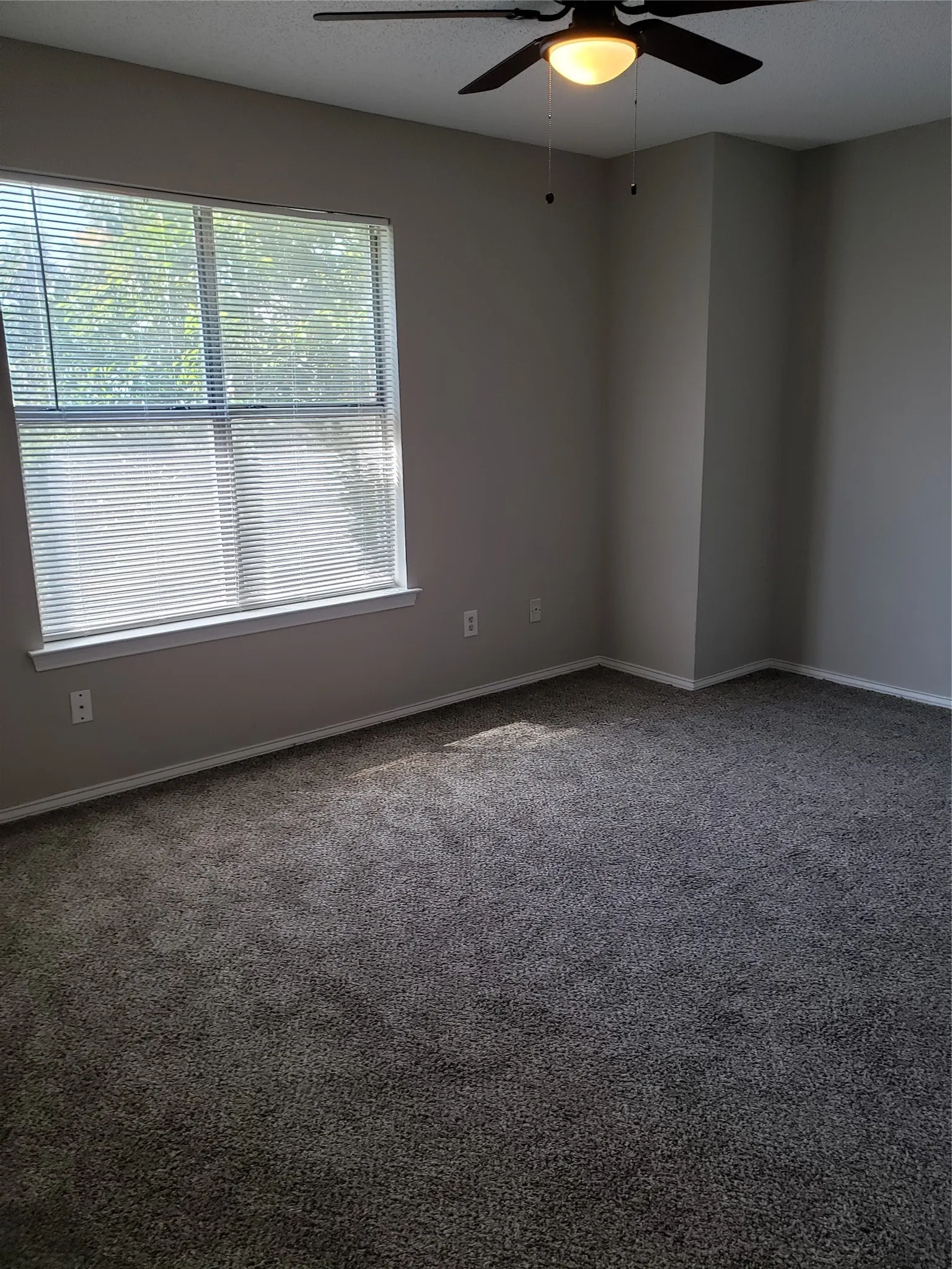 808 - Bedroom with two closets and ceiling fan.