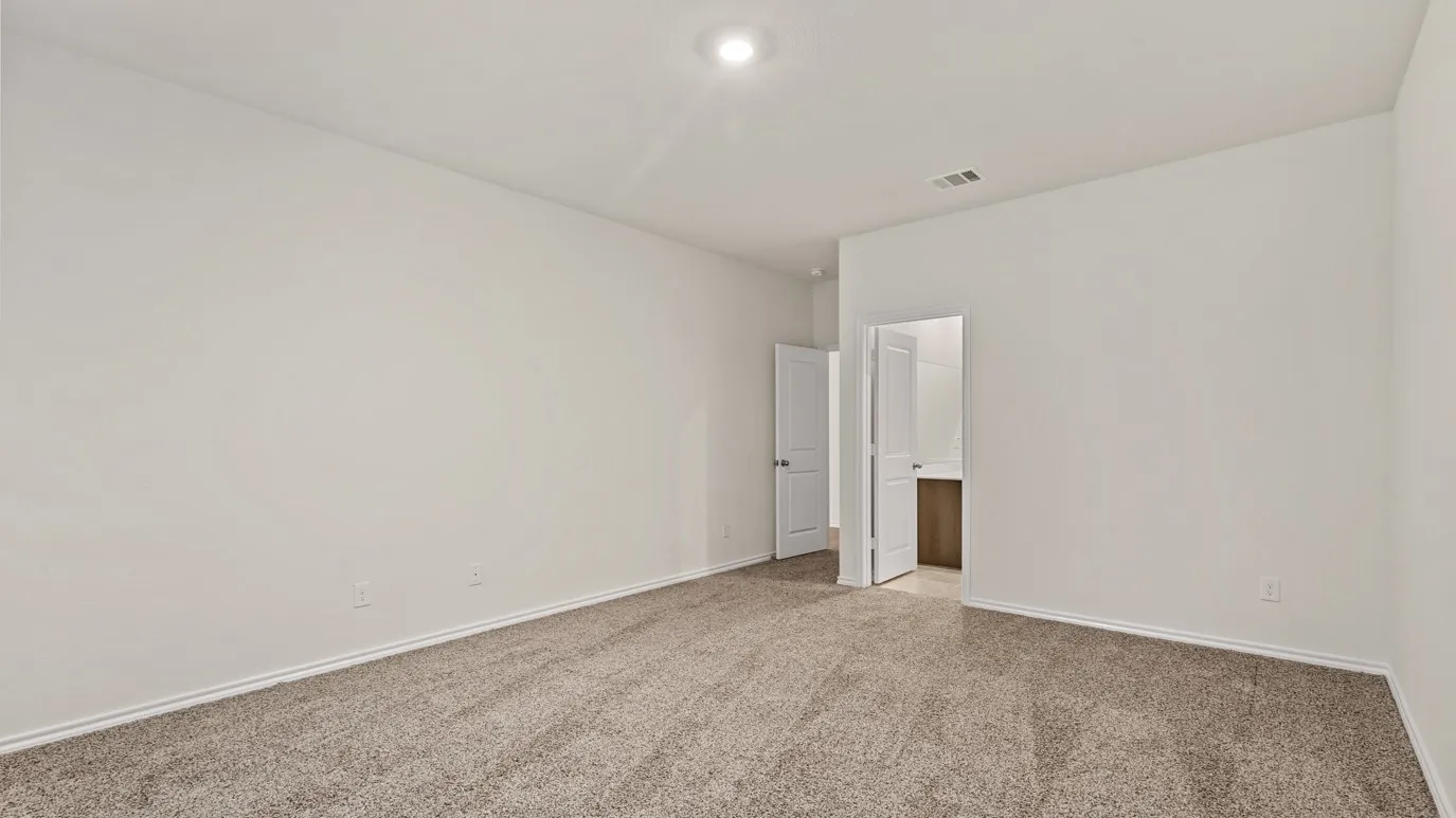 Neutral-toned carpeting throughout