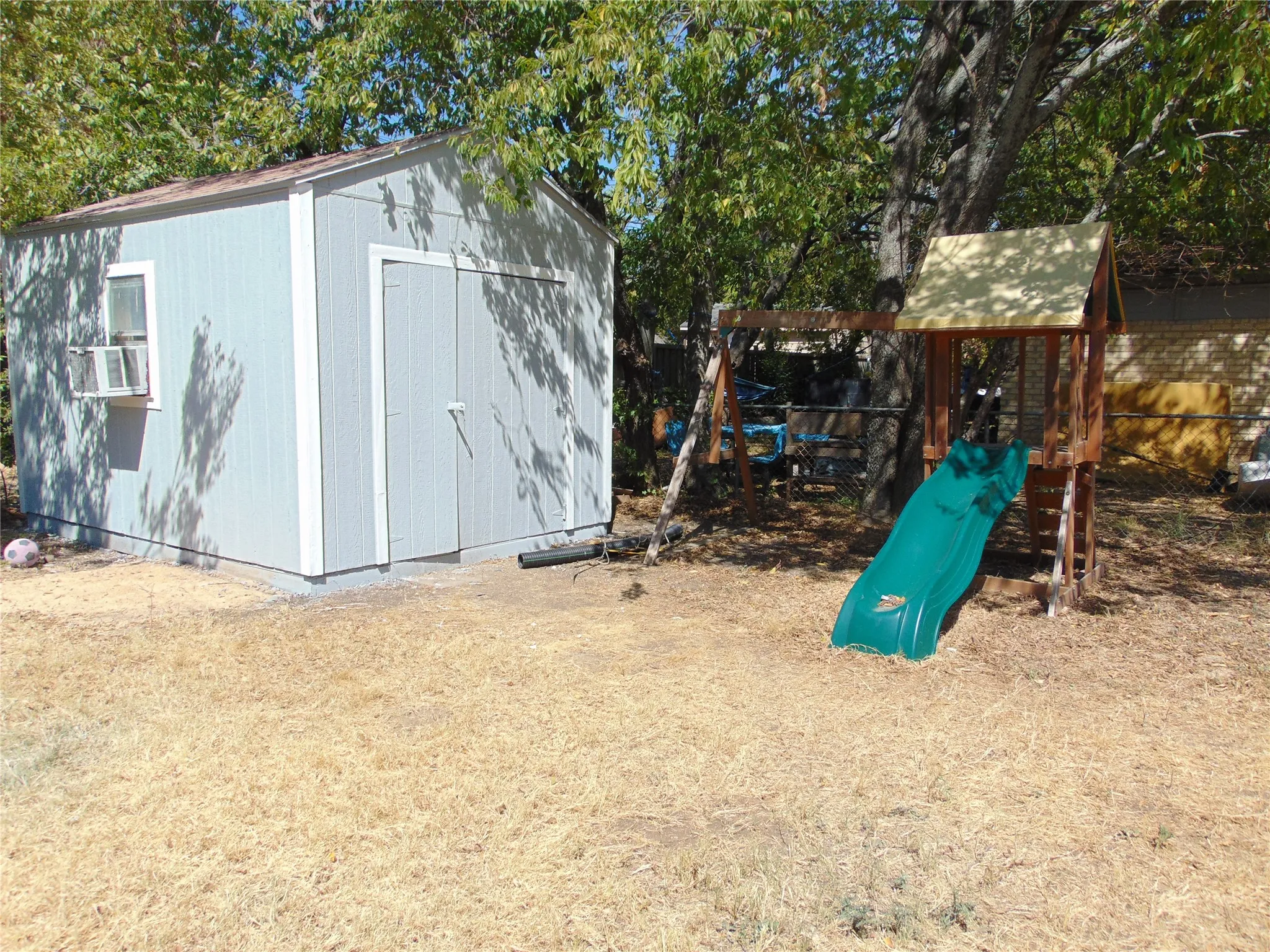 comes with shed and playset.
