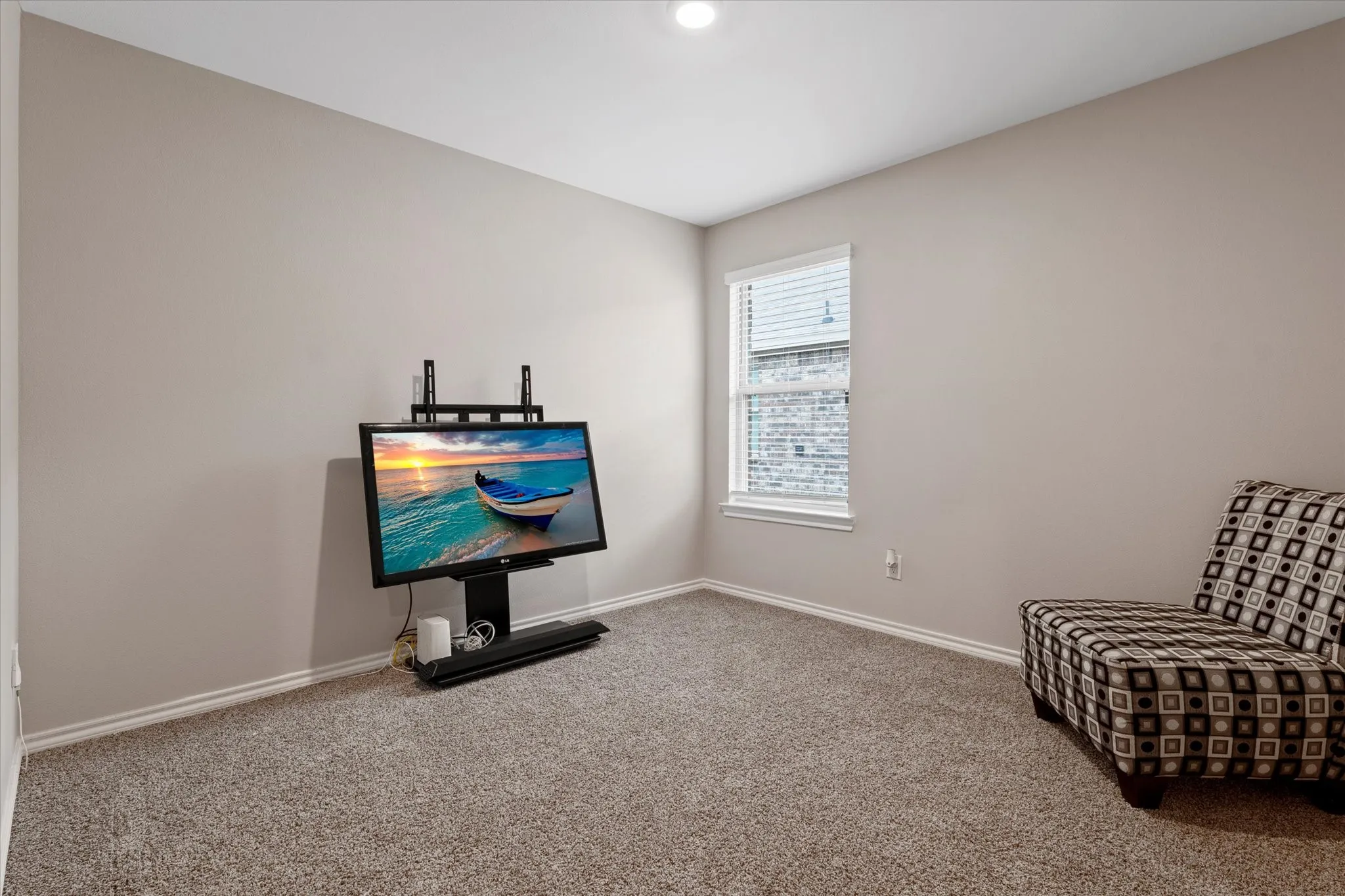 Unfurnished room with baseboards and carpet