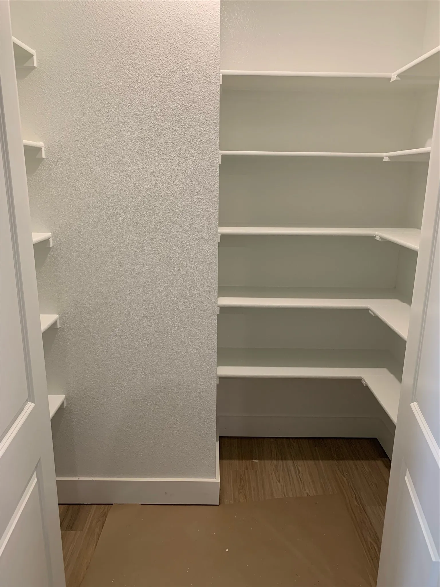 Oversized hall closet creates tons of storage options.