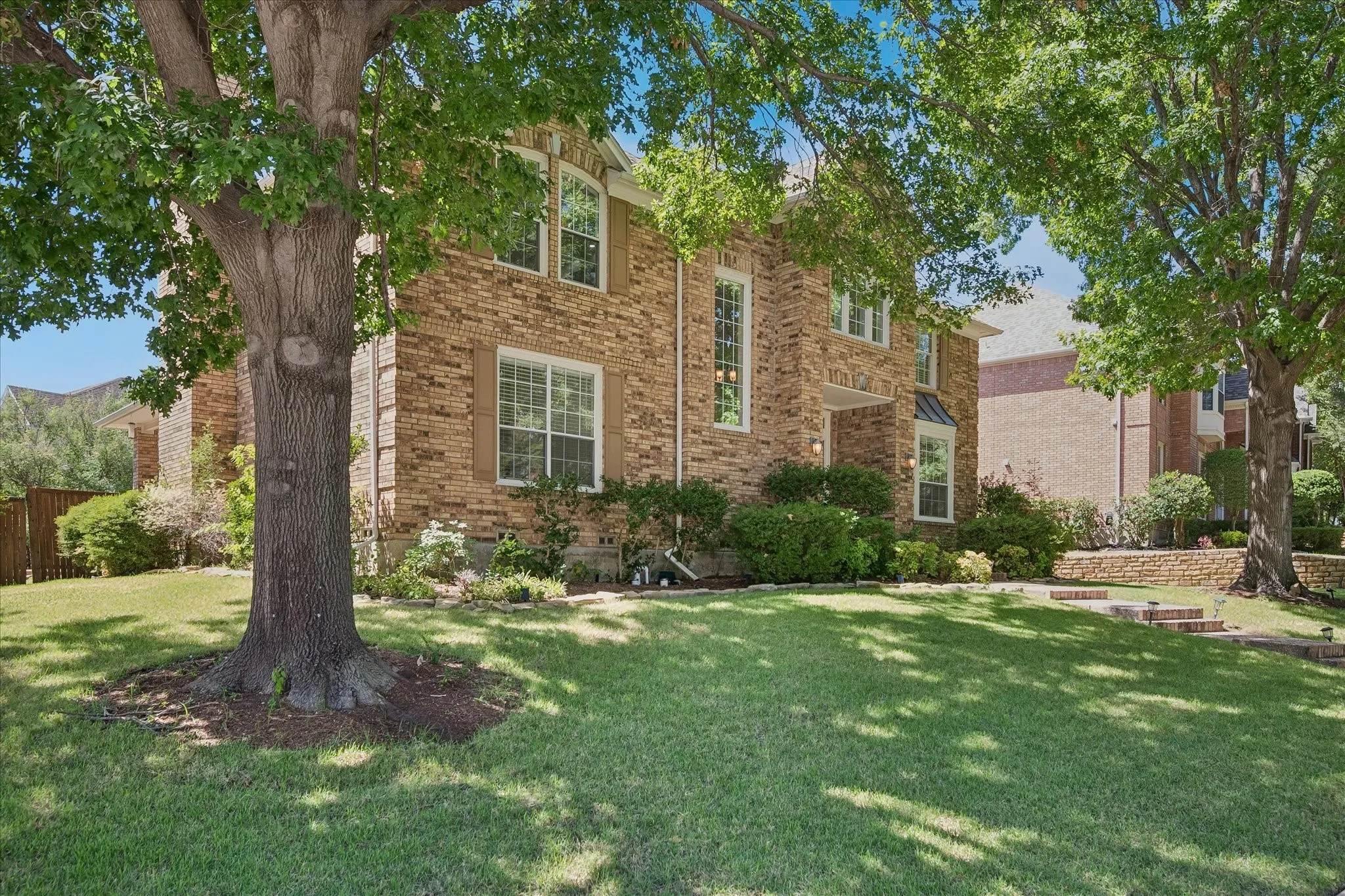 Brick exterior with decorative shutters