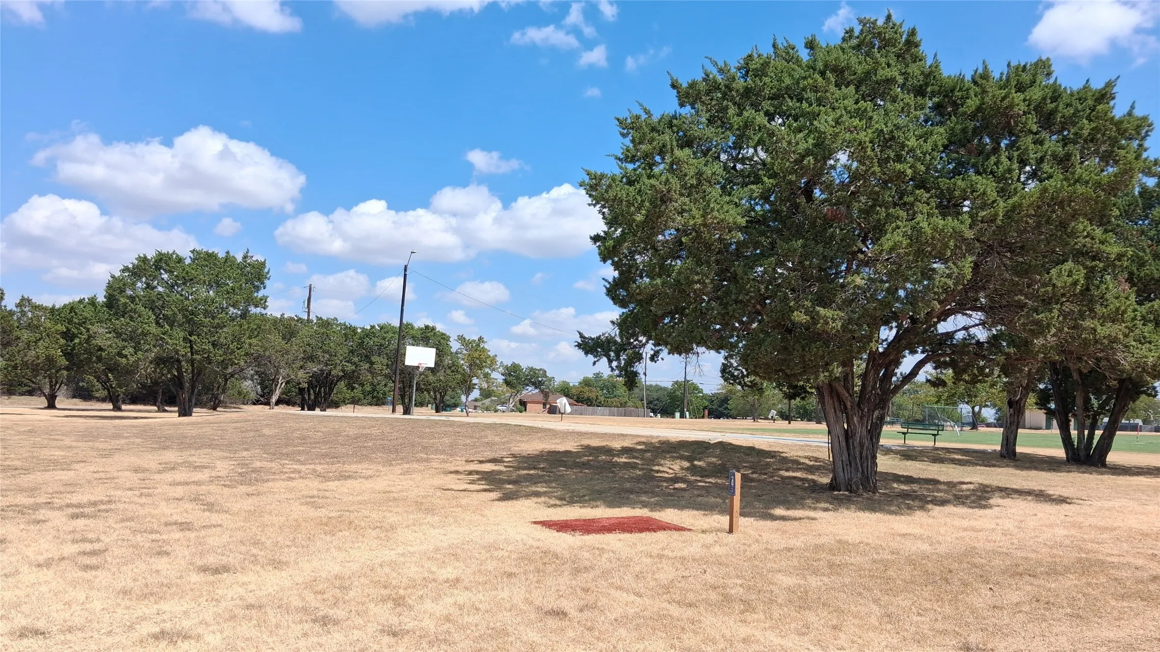 Community park has Basketball, frisbee golf, baseball field.