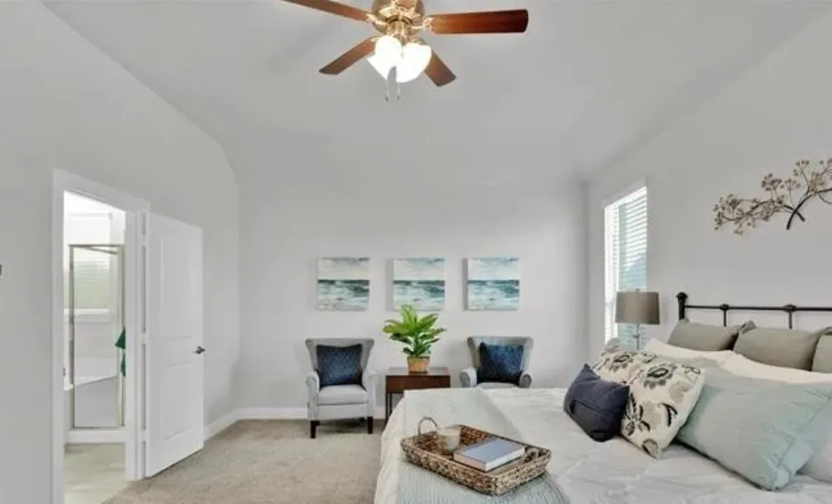 Room featuring a ceiling fan, window with blinds, and carpet flooring