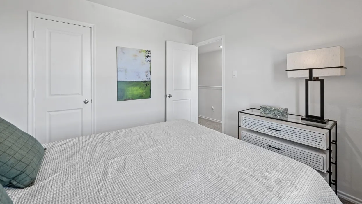 Recessed ceiling lighting, white interior doors, and light neutral wall paint