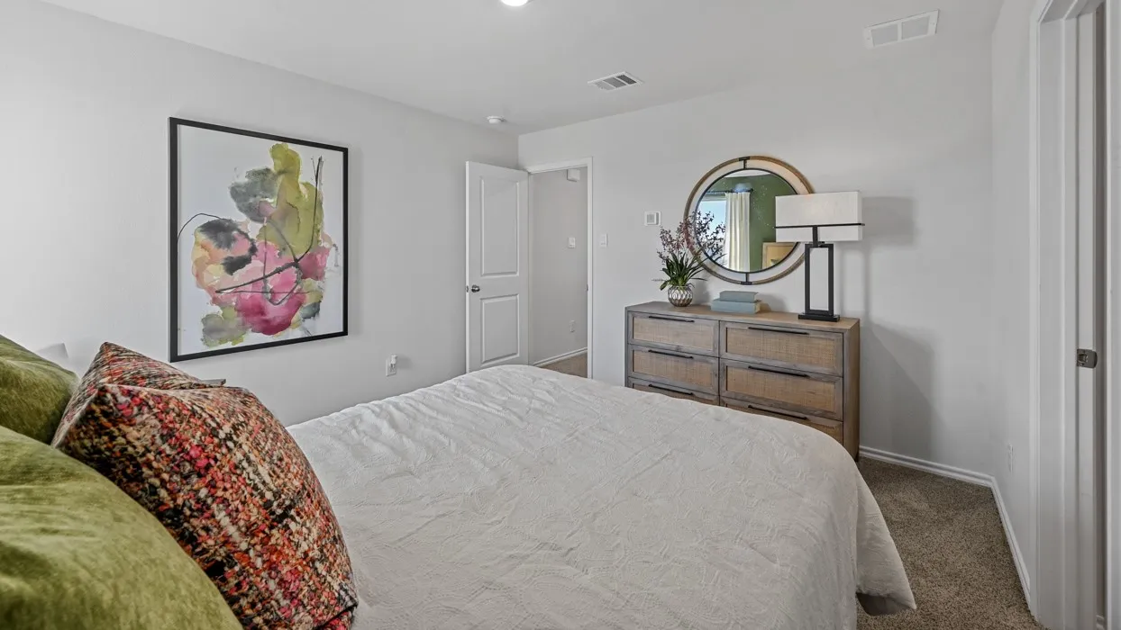 Wall-to-wall carpeting with light gray walls and white trim