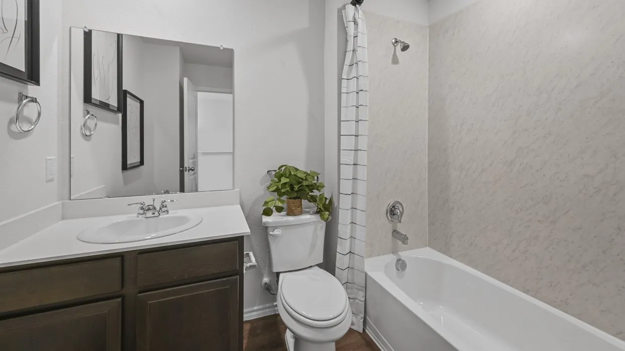 Integrated vanity with a white countertop and undermount sink