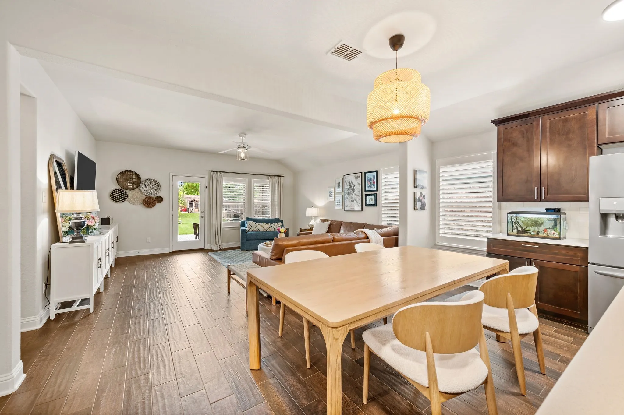 You will this open concept dining area!  The updated chandler and the large space makes it a great space to enjoy your meals!