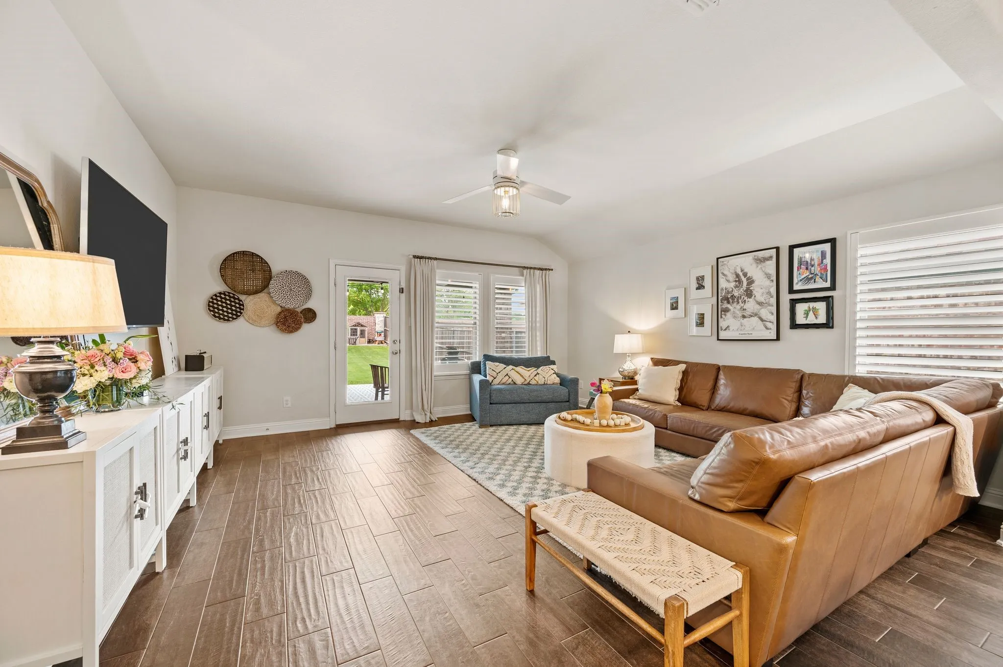 Large living room filled with amazing natural light.  This room is perfect for large living room furniture and a great space to entertain your guests!