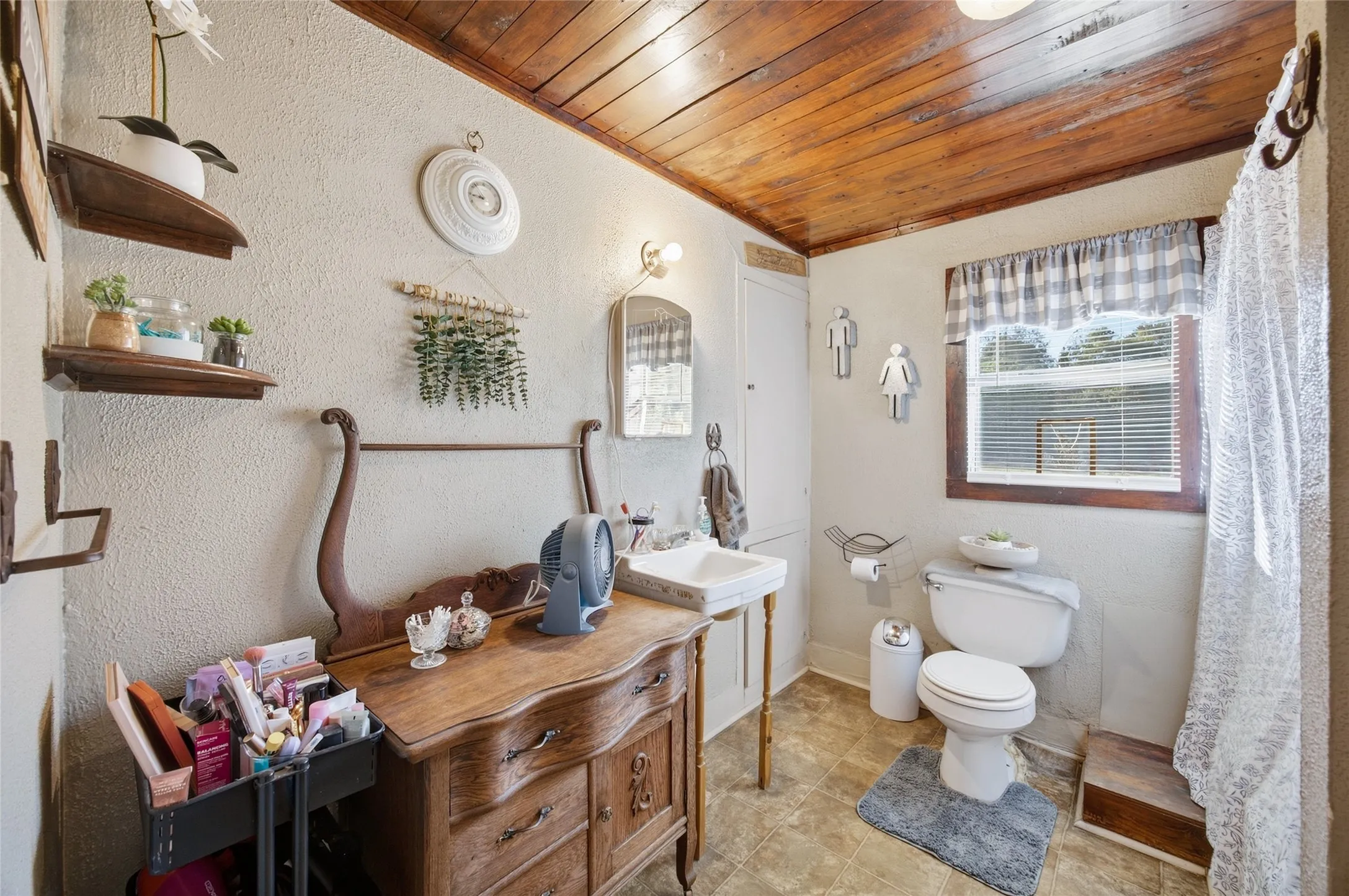 Wood-paneled ceiling with recessed lighting