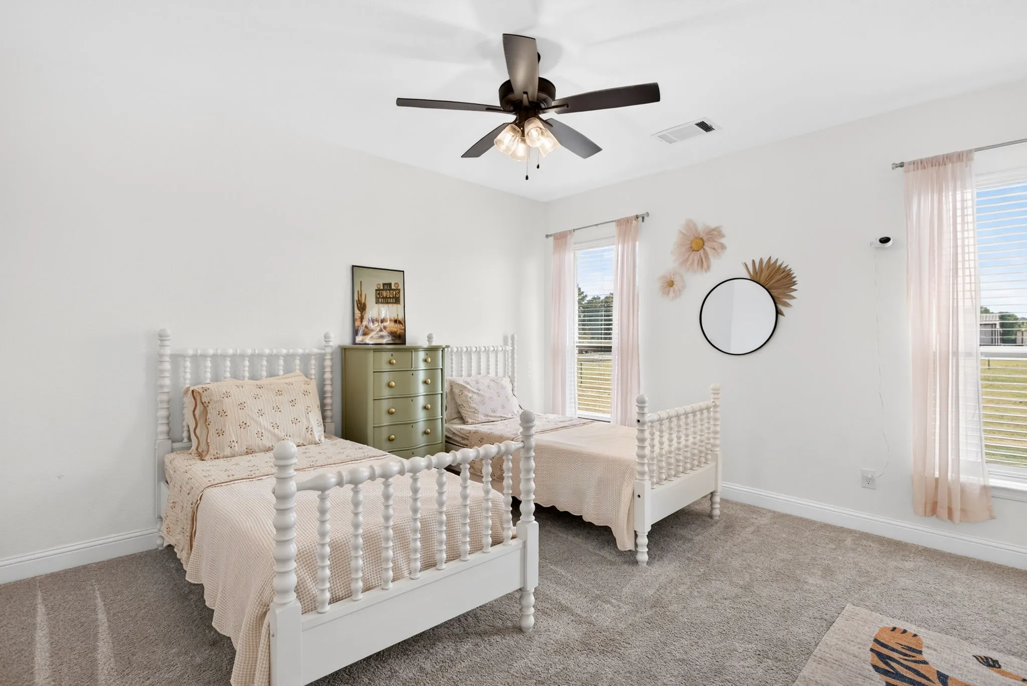 Fabulous bedroom on the opposite side of the home with views to the backyard.