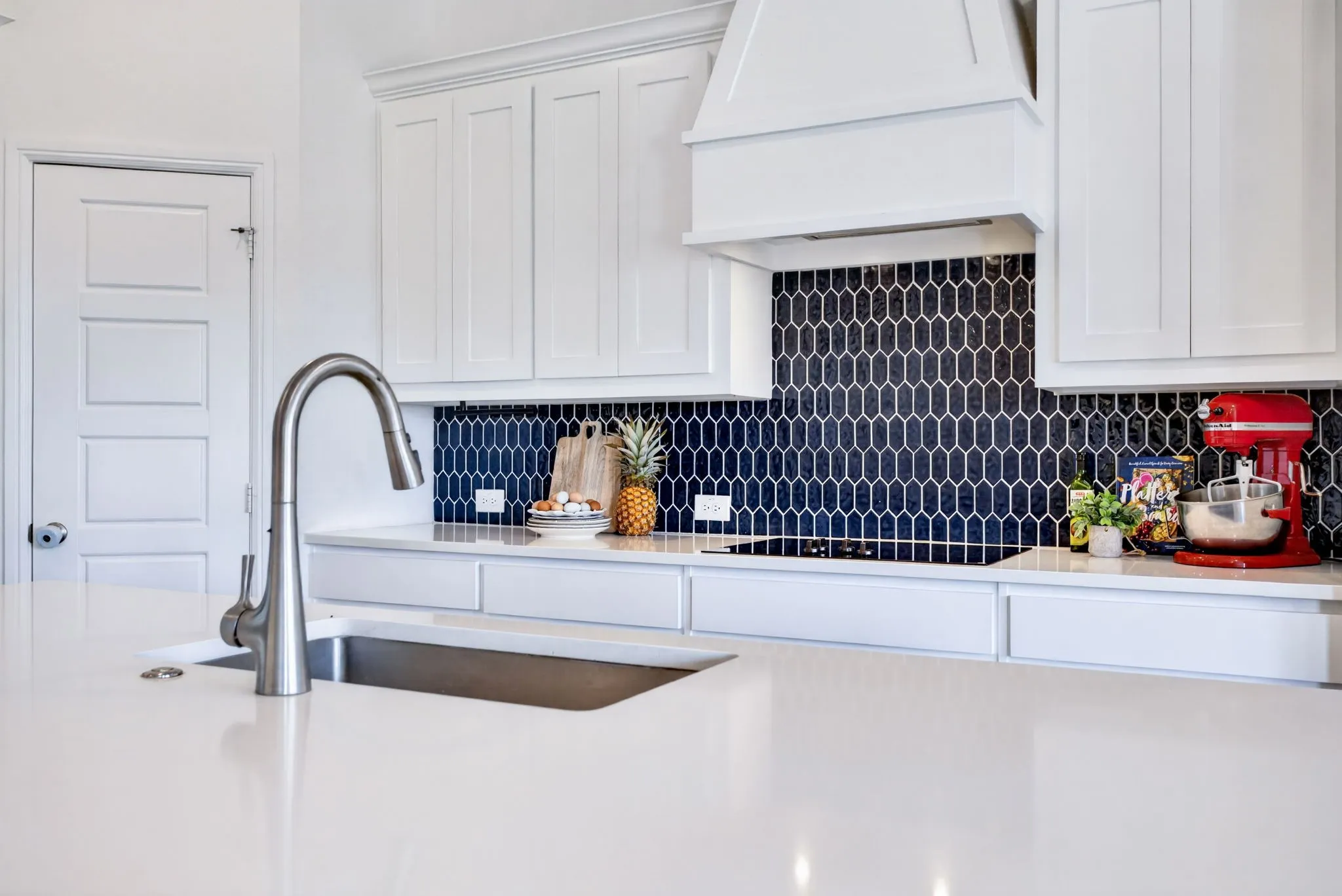 We LOVE the backsplash in this kitchen.