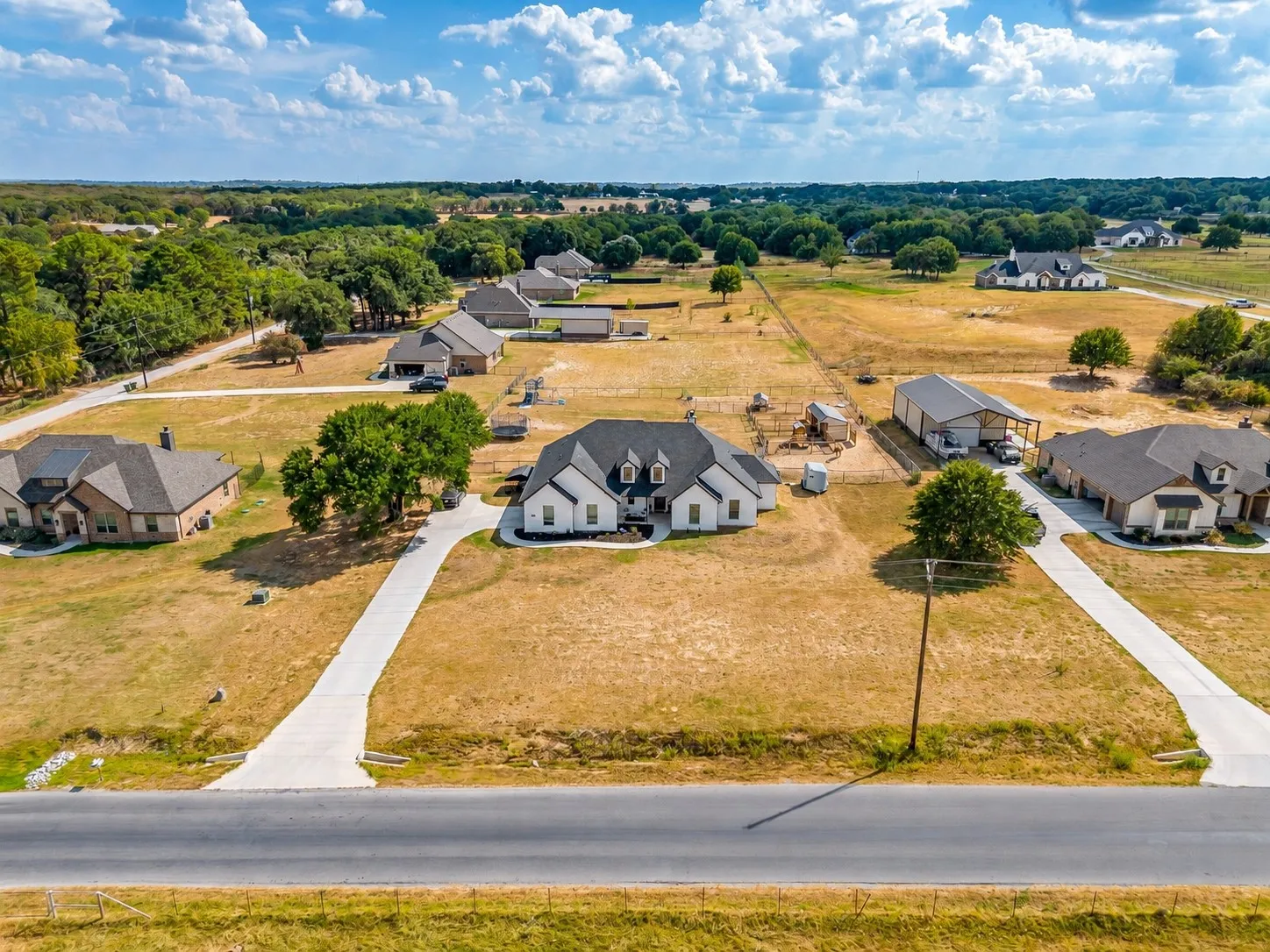 Welcome to pure country living on an acre of Texas land in Boyd at 731 CR 4764!