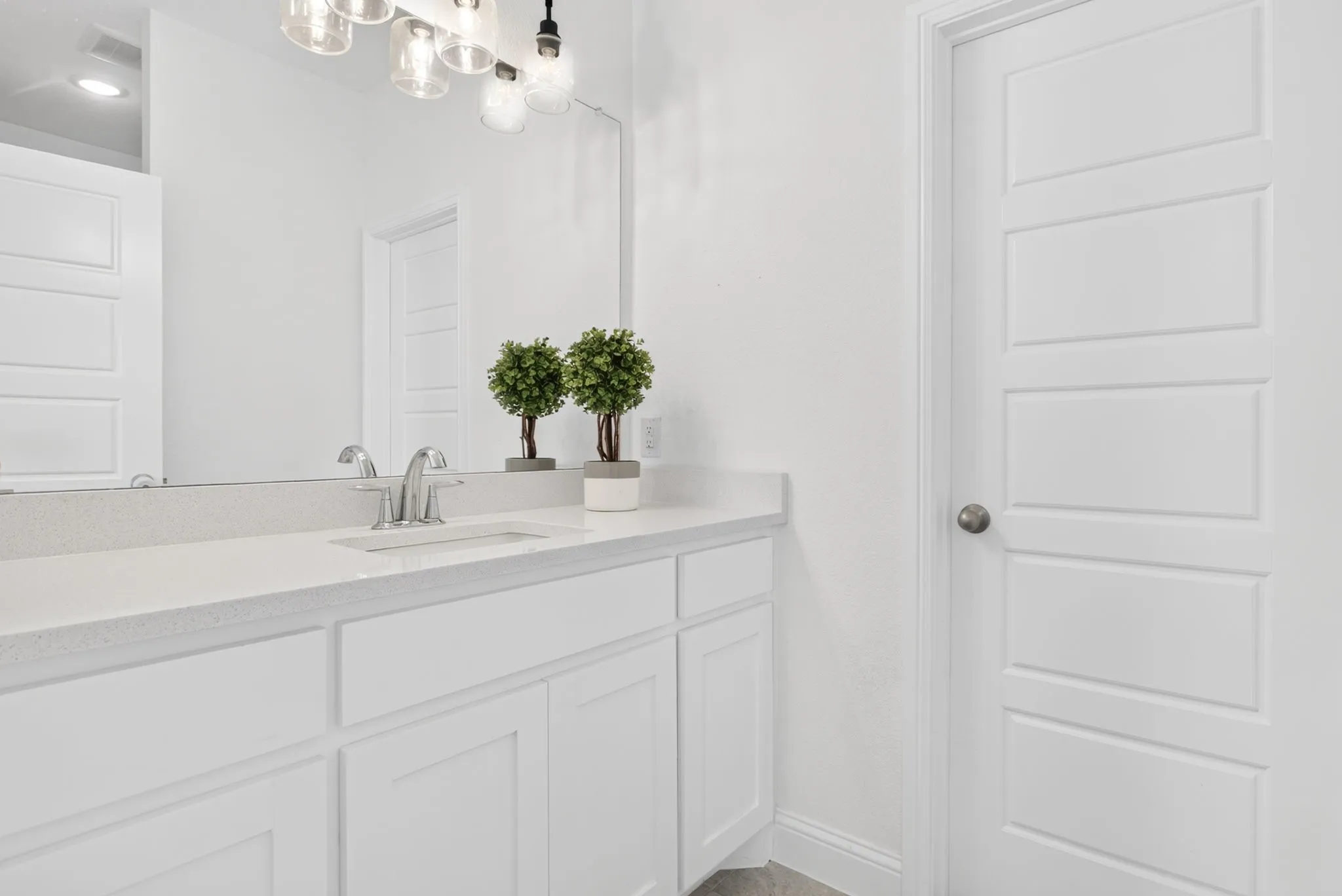 Generous single vanity with HUGE walk-in closet.