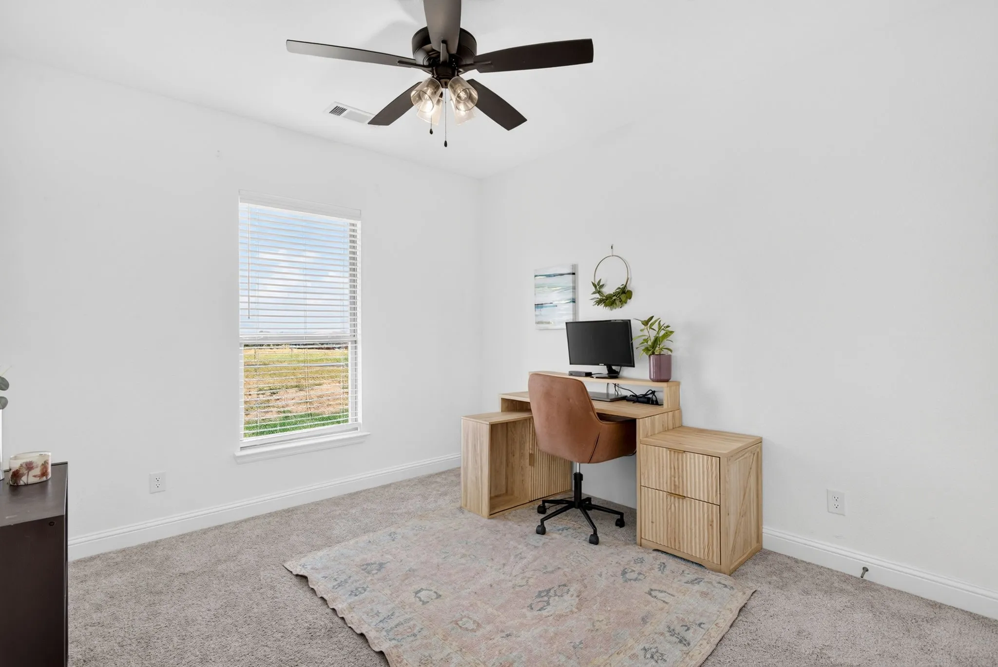 At the front of the home are two more bedrooms.