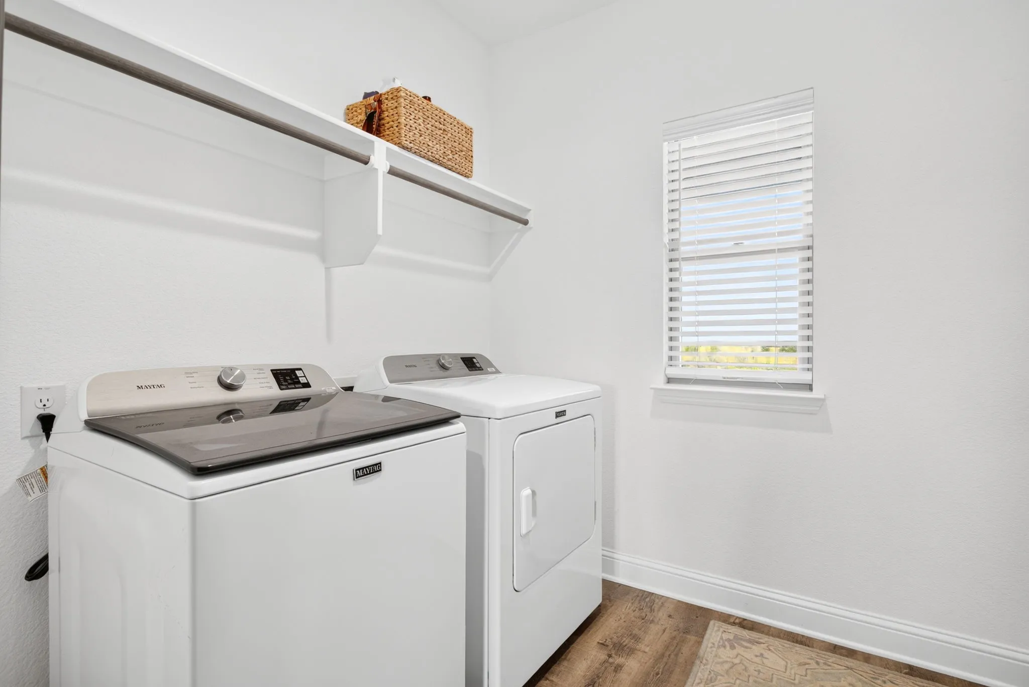 Laundry room is spacious and ready for your personalization.