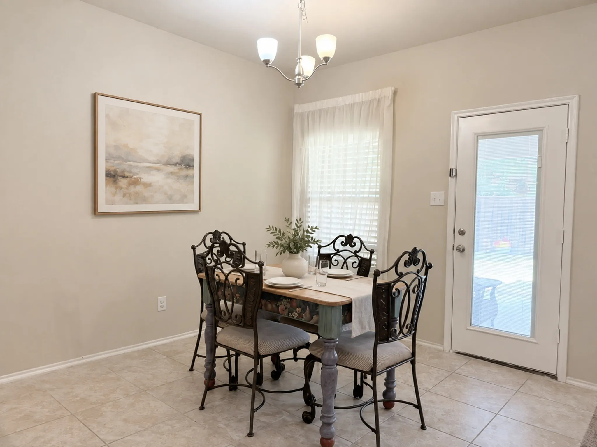 Recessed lighting with a three-light chandelier, a window with horizontal blinds and sheer curtain, a glass-paneled door, and neutral-toned tile flooring