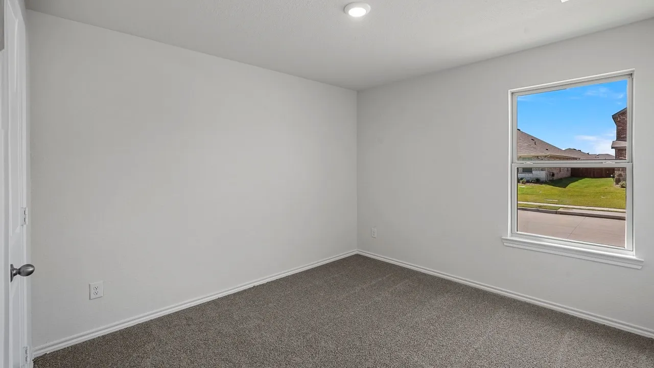 Recessed ceiling lighting, a single window, and carpeted flooring