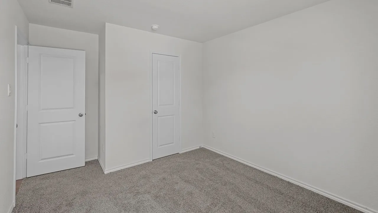 Neutral paint palette with wall-to-wall carpeting