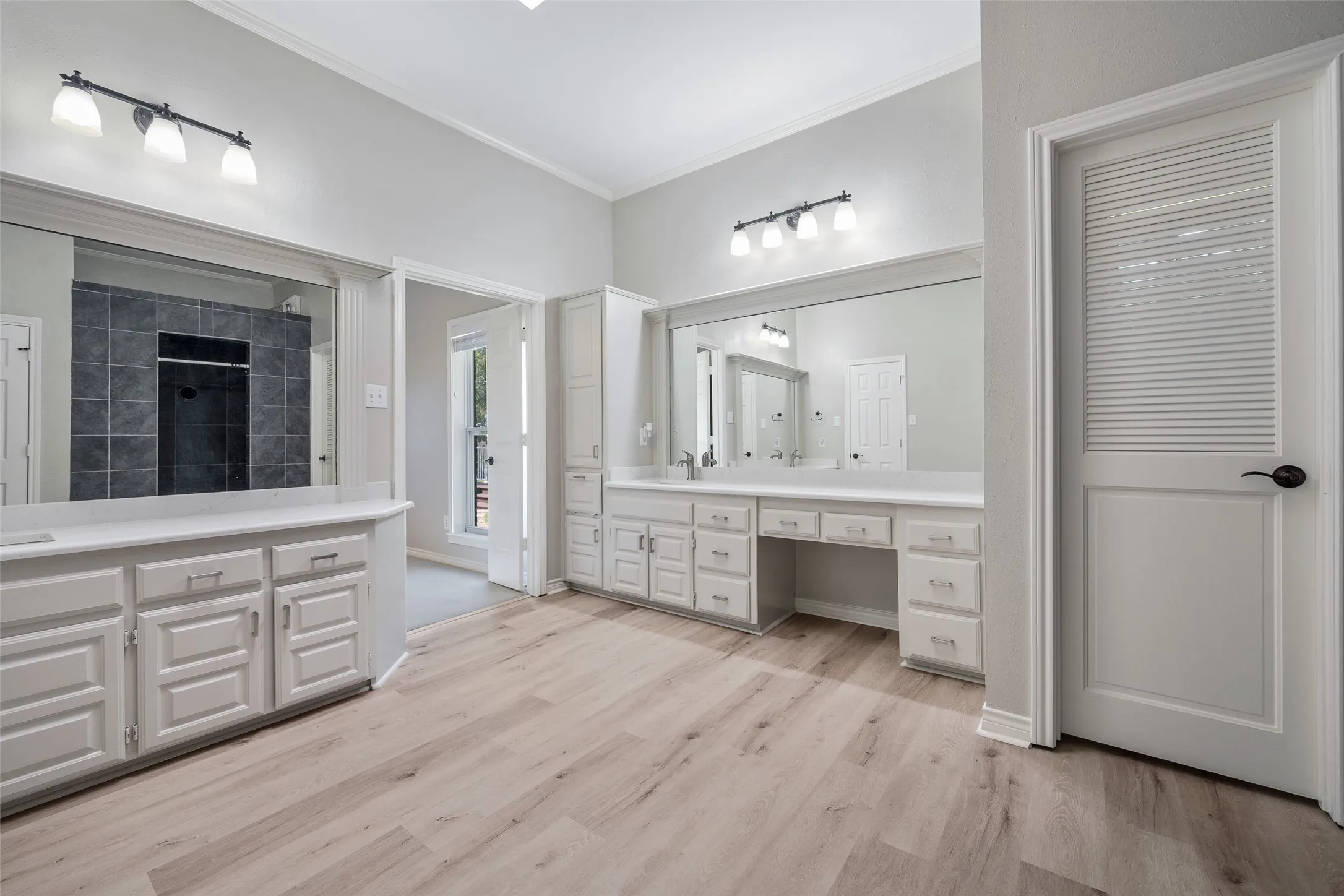 Primary bath with 2 walk-in closet and a cedar closet