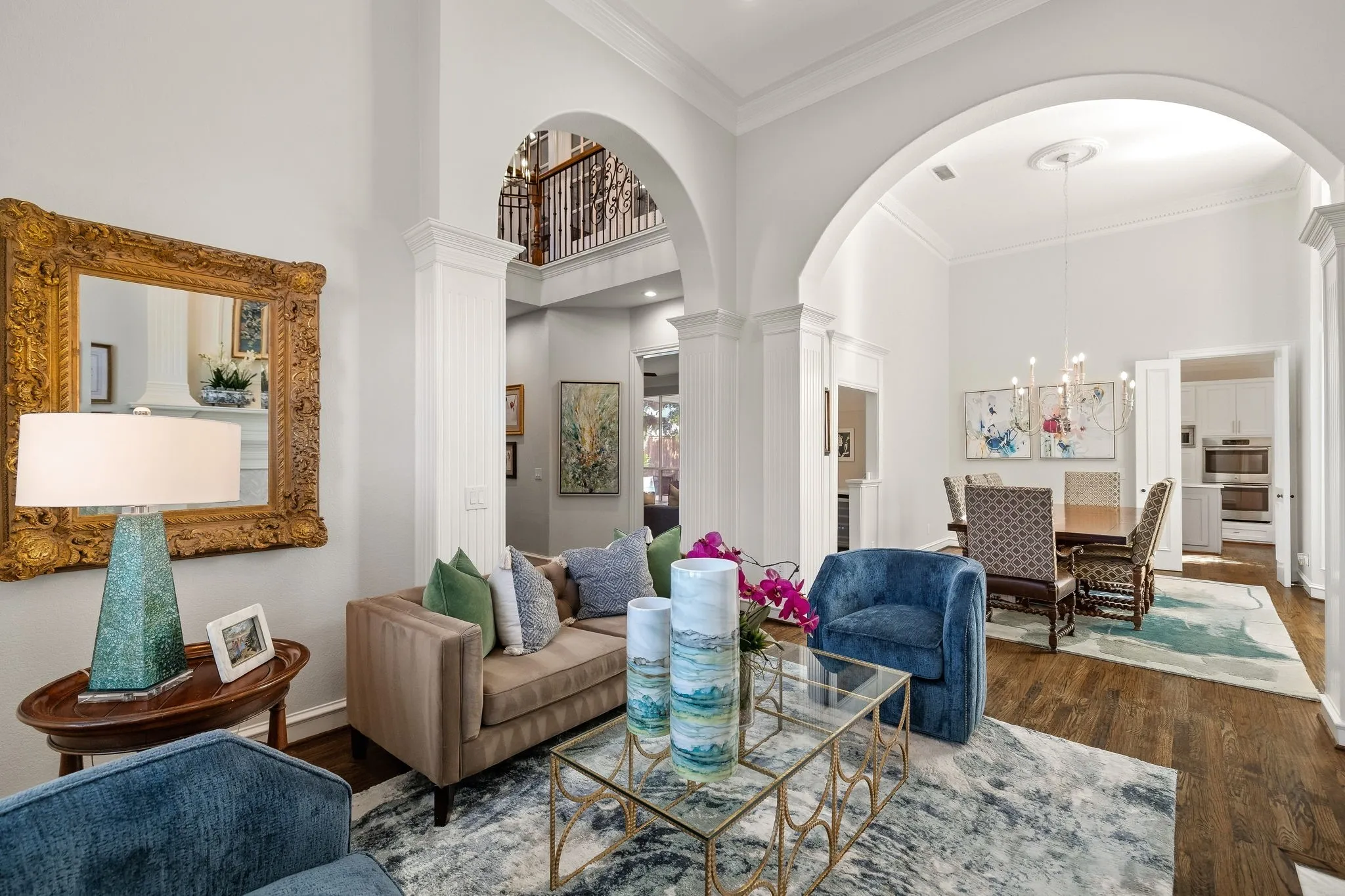 Beautiful living room flows seamlessly into the formal dining room.