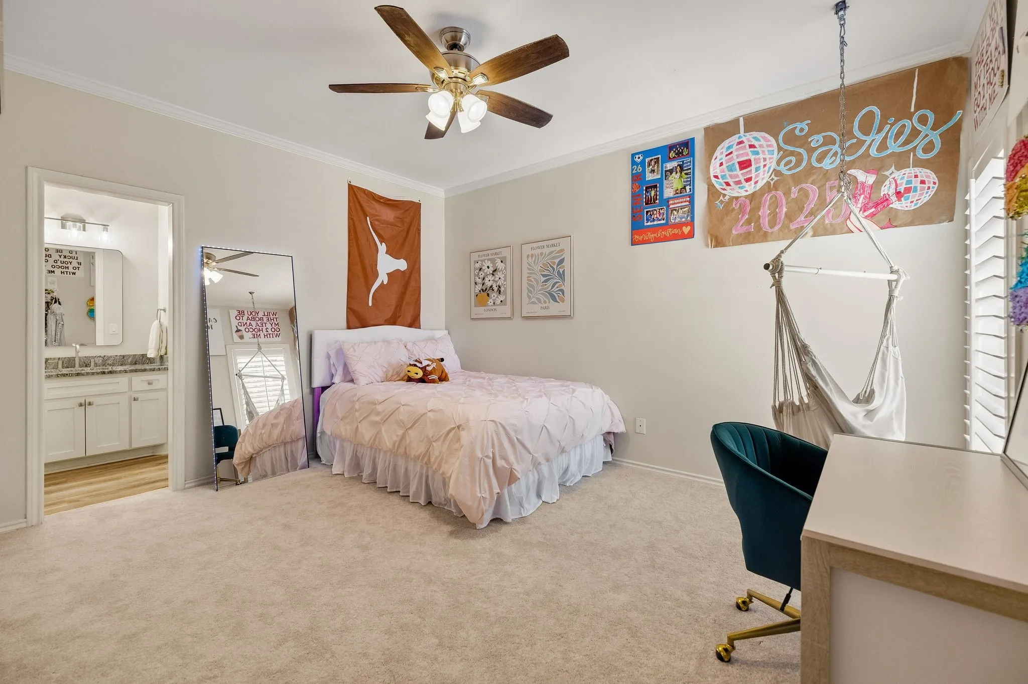 Secondary bedroom with custom closet system & access to Jack & Jill bathroom.