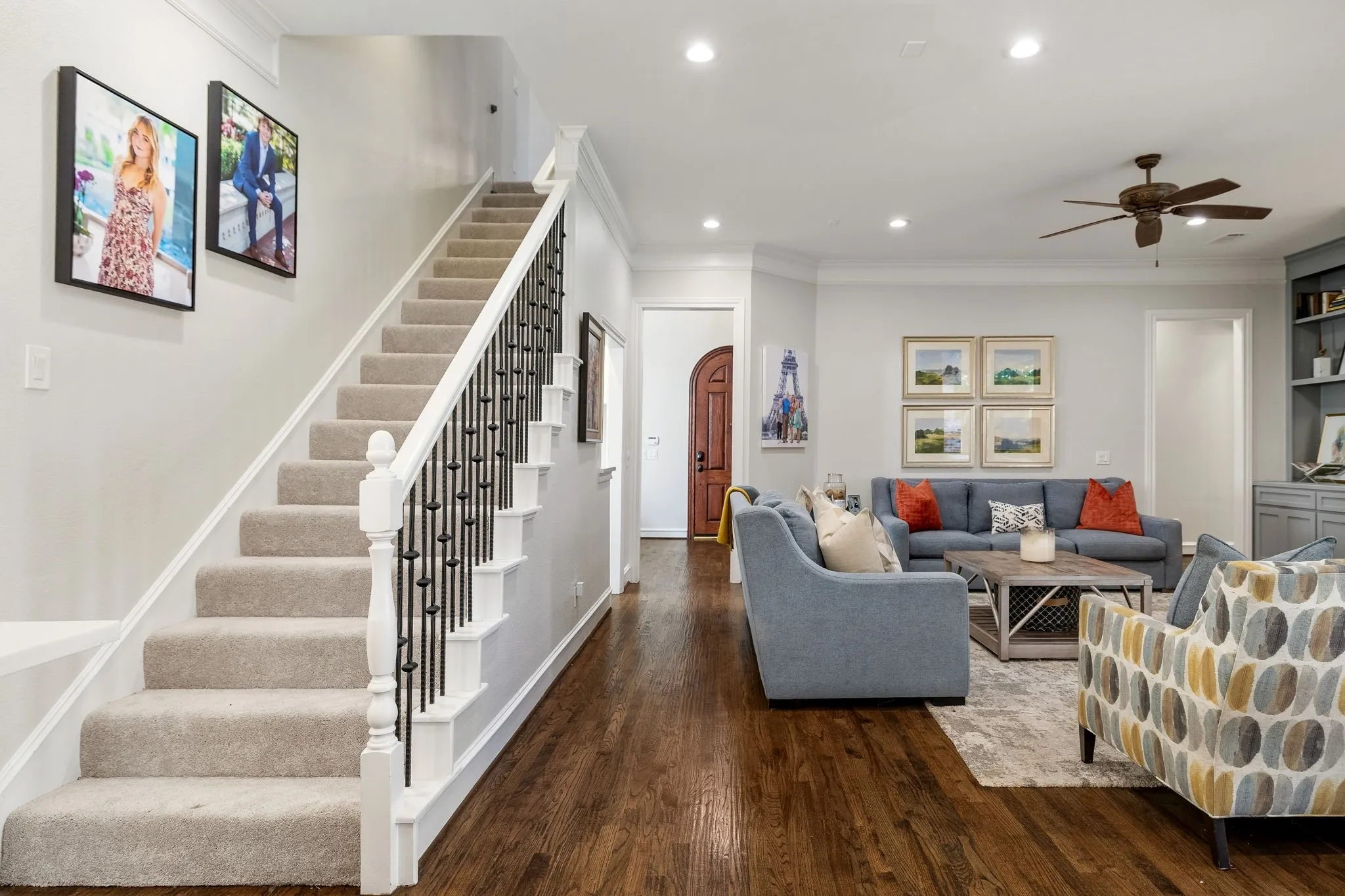 Dual staircases (one from the front entry & this one from the family room)