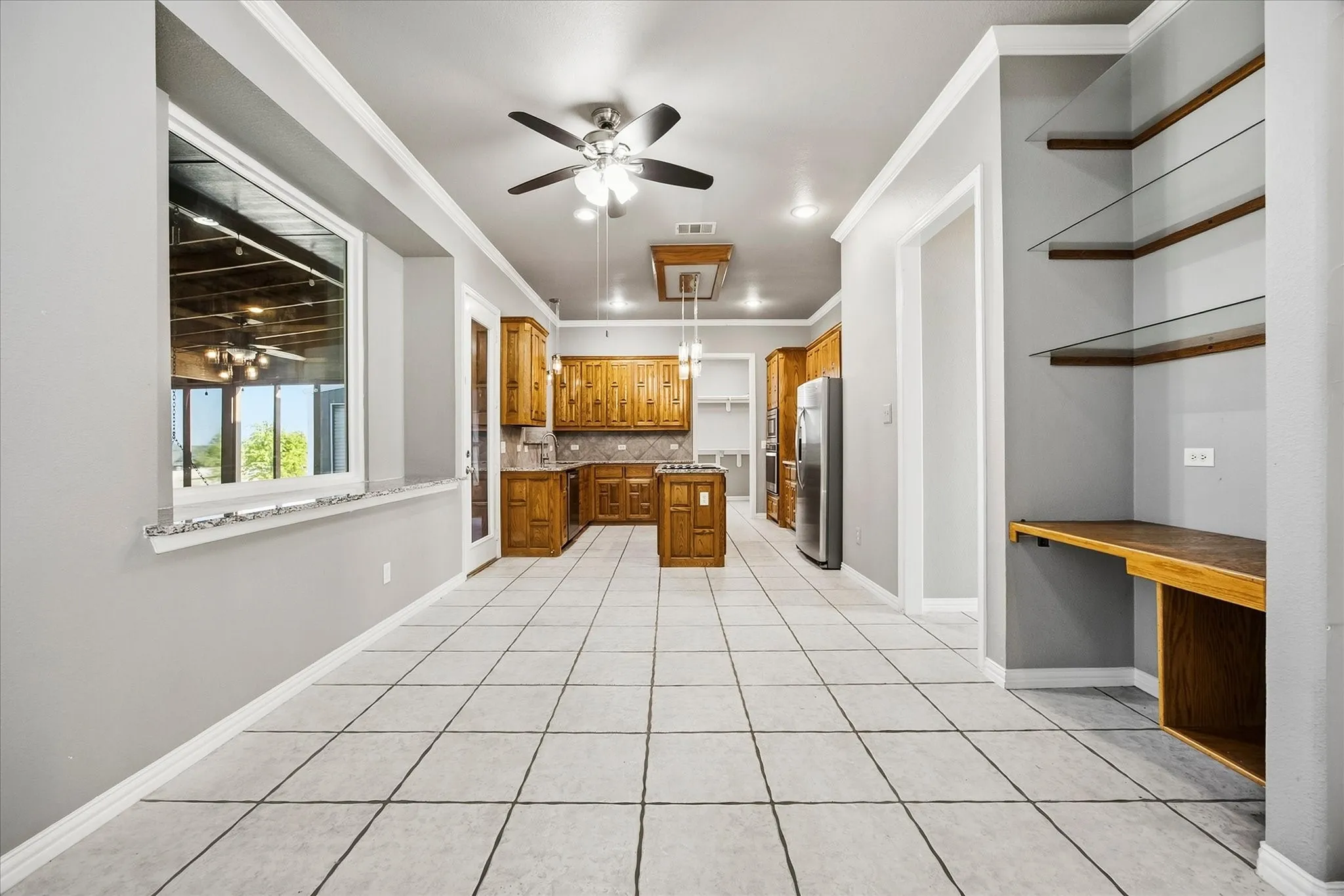 Kitchen opens onto dining area