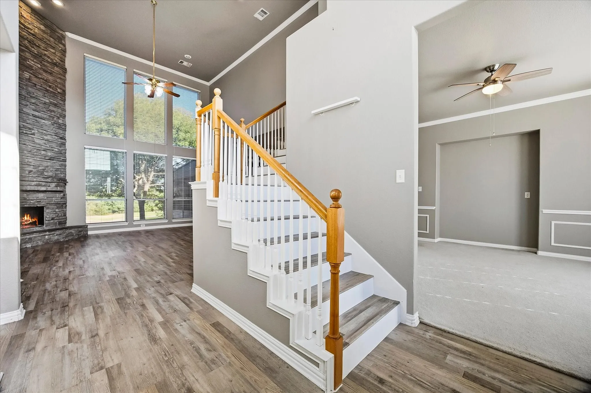 Towering ceilings and impressive staircase are only a few of this home's many amenities