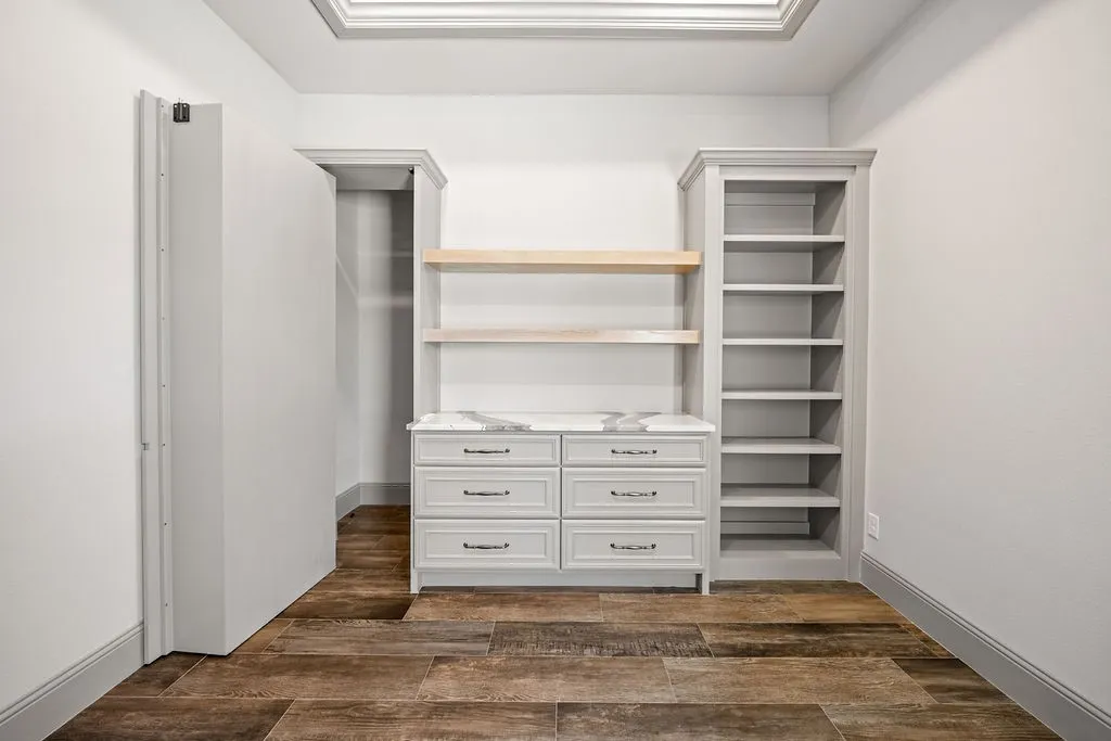Built-in cabinetry with drawer storage and light-toned countertops