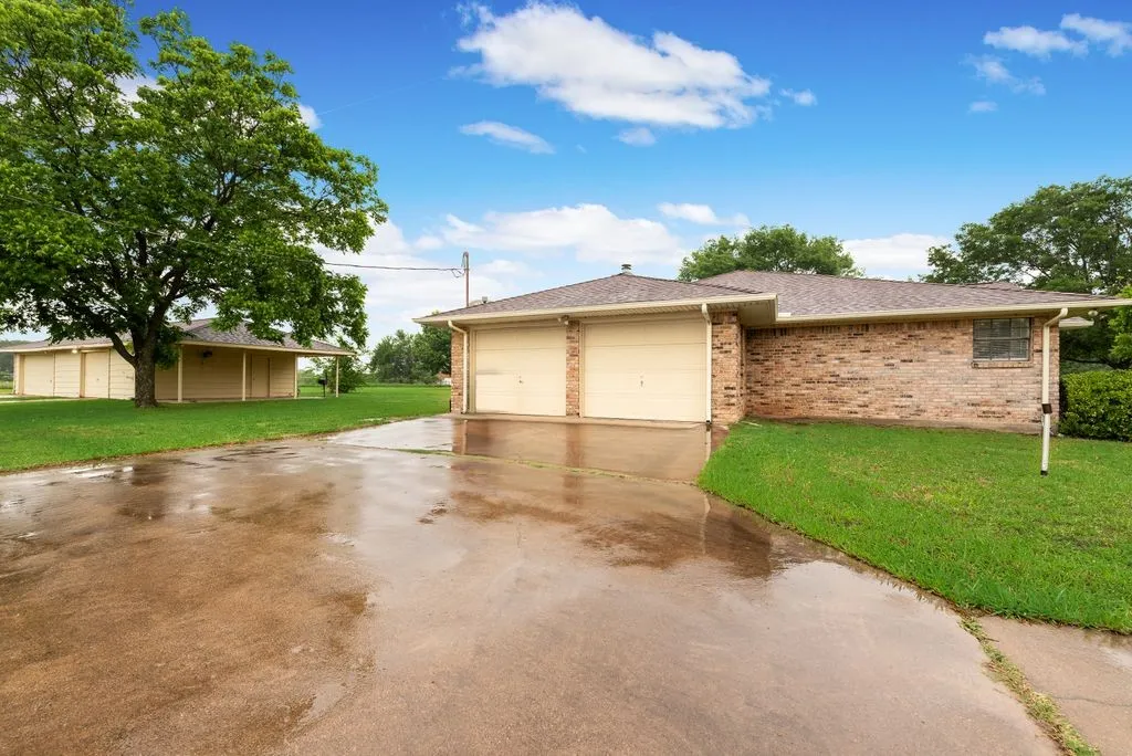 Attached Two Car Garage with Extra Driveway Parking