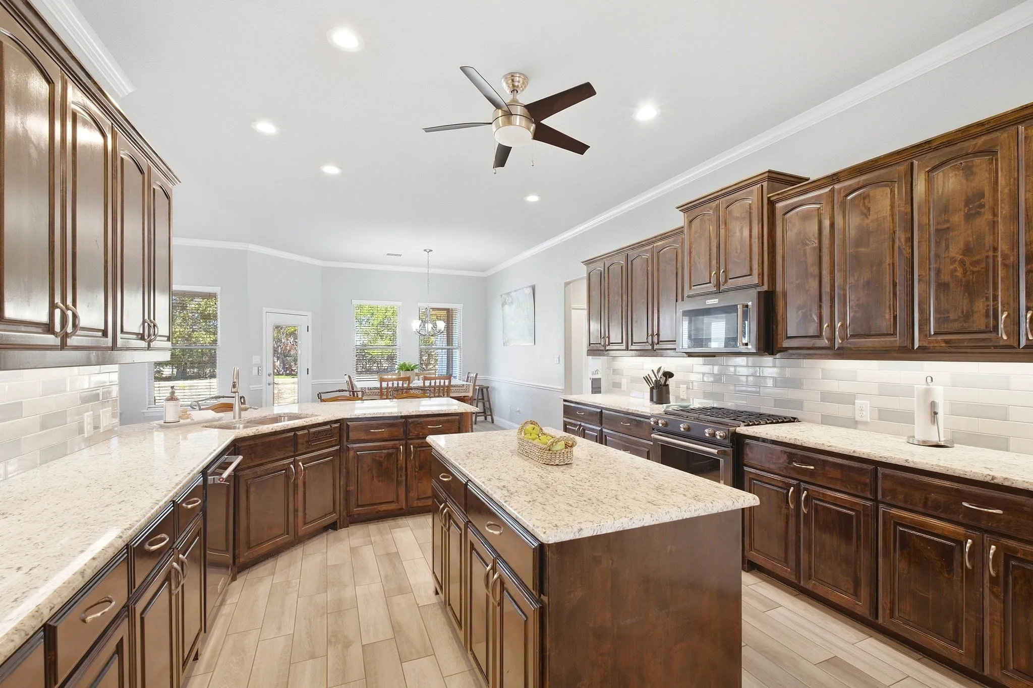 Stunning Kitchen with lots of counterspace, gas cooktop, stainless appliances and handsome cabinets.