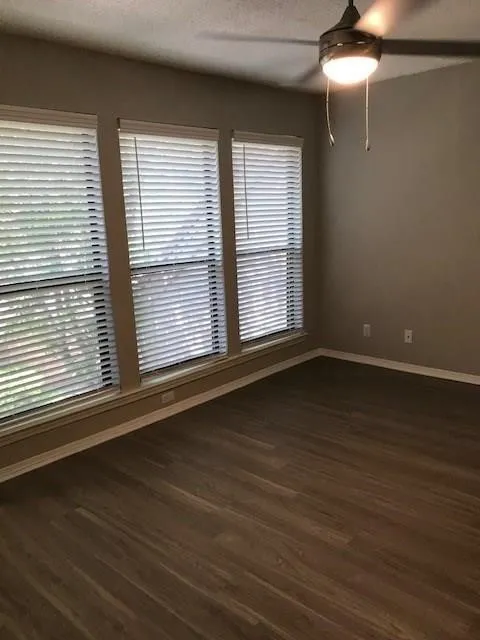 Wood-finish flooring throughout