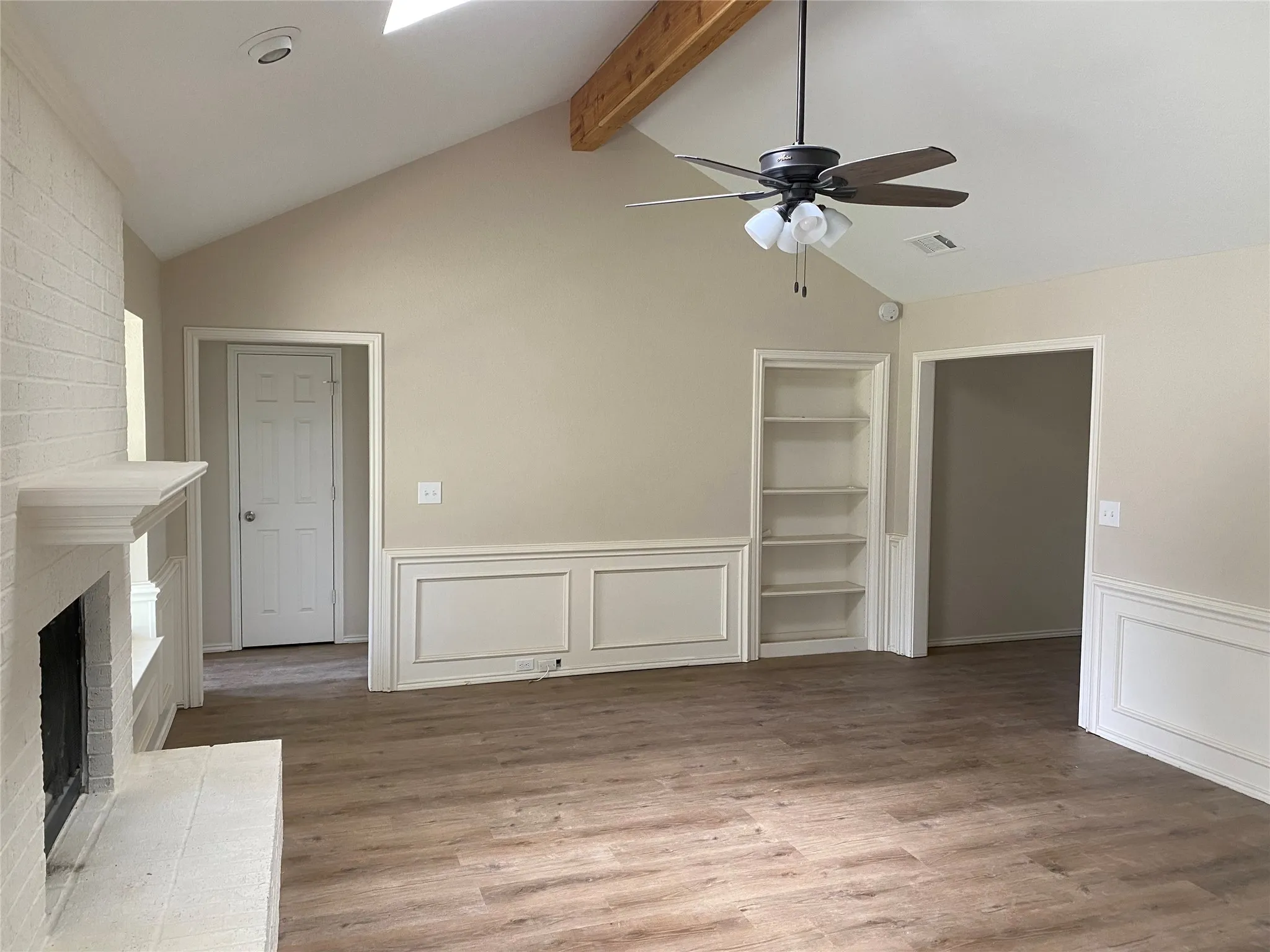 Spacious Living Room with catherdral ceiling.