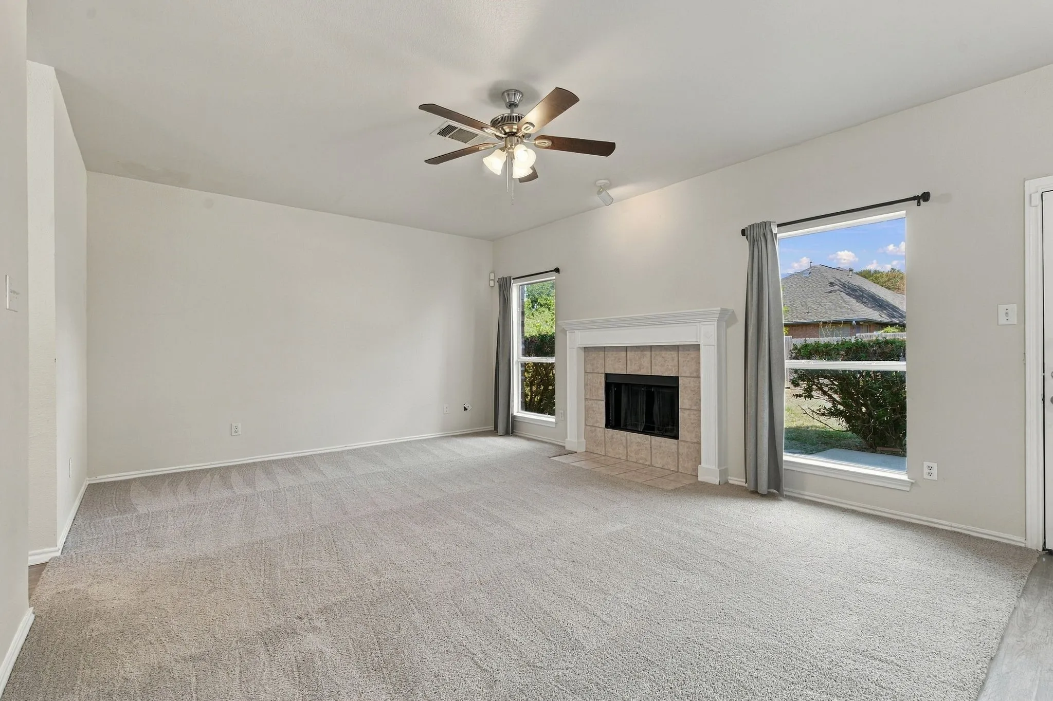 Neutral-toned carpeting throughout