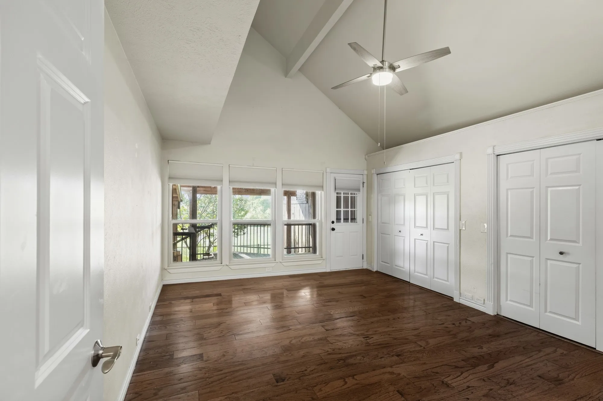 Primary Bedroom with deck overlooking Golf Course to enjoy morning coffee on Main Floor