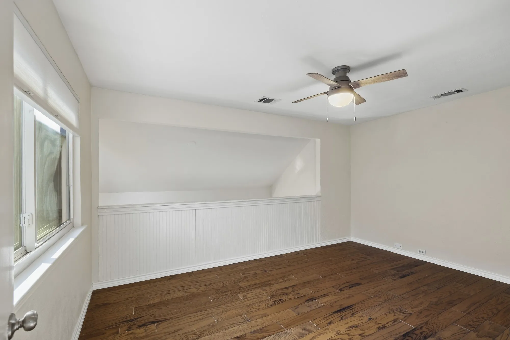 Upstairs bedroom with loft over family room