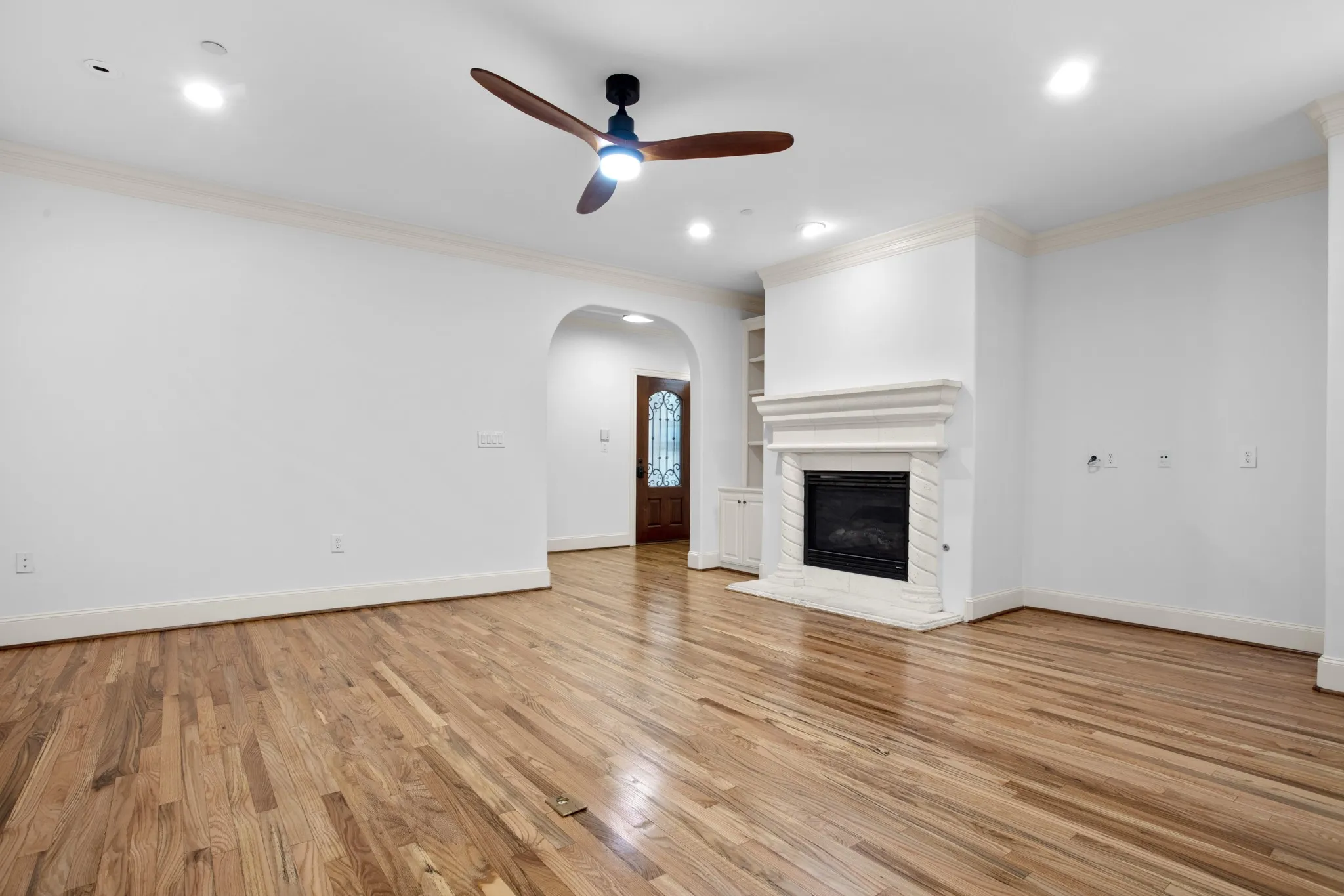 Living area with gas fireplace and entryway