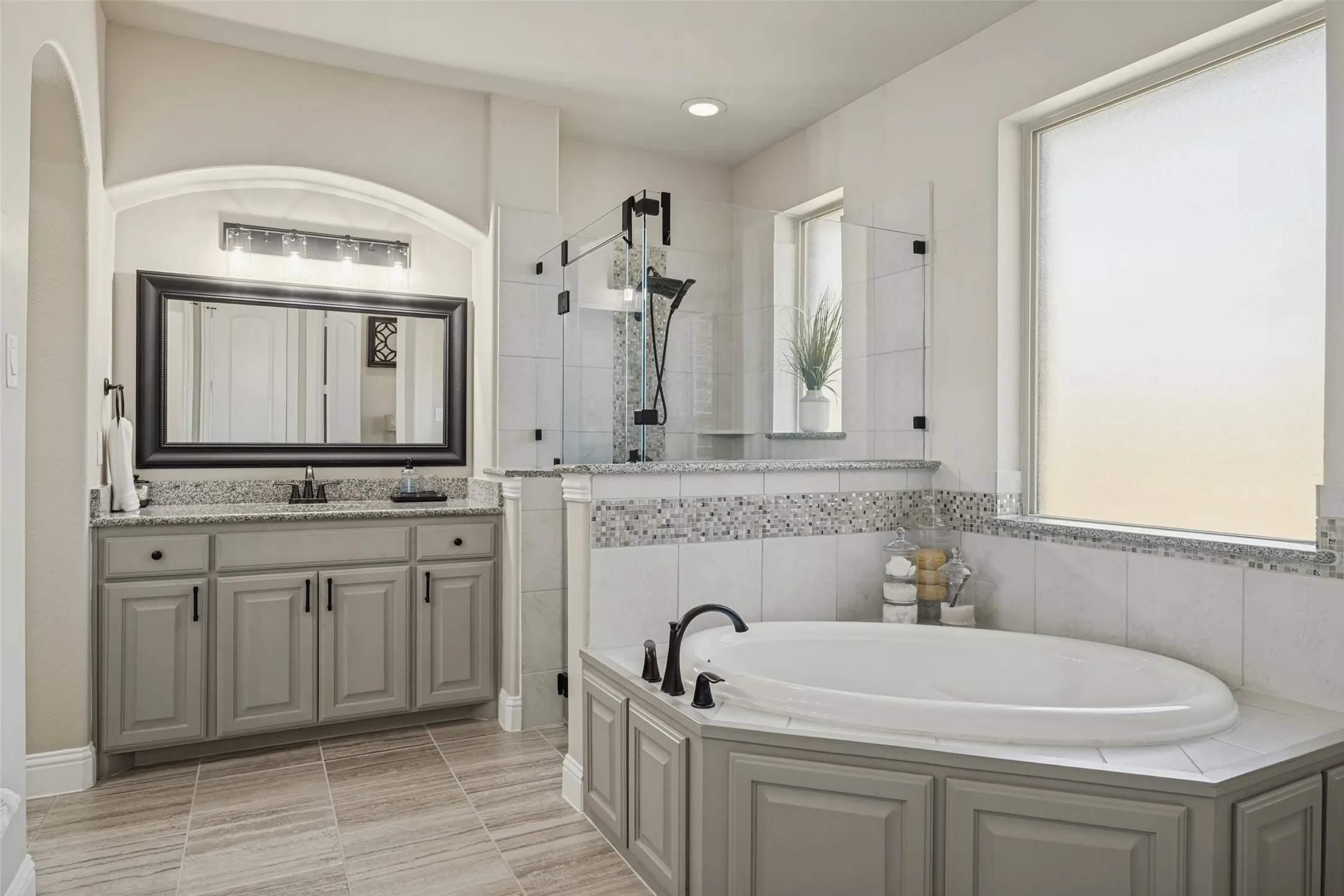 Separate tub, shower, vanities