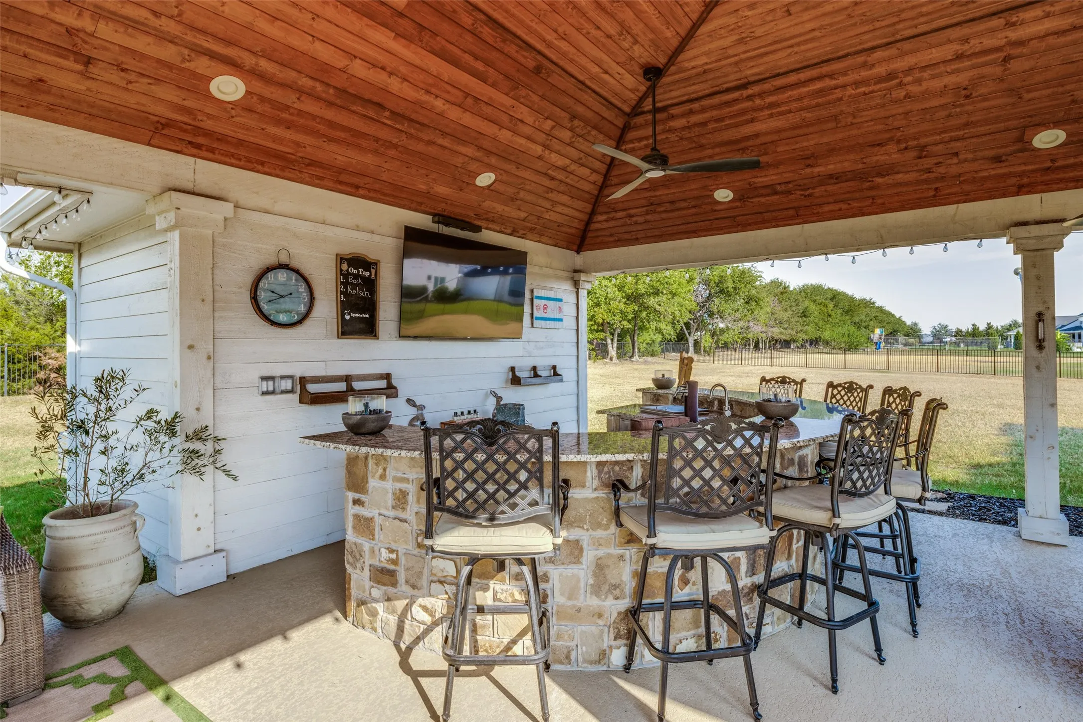 Watch the game while sipping cool drinks at the bar
