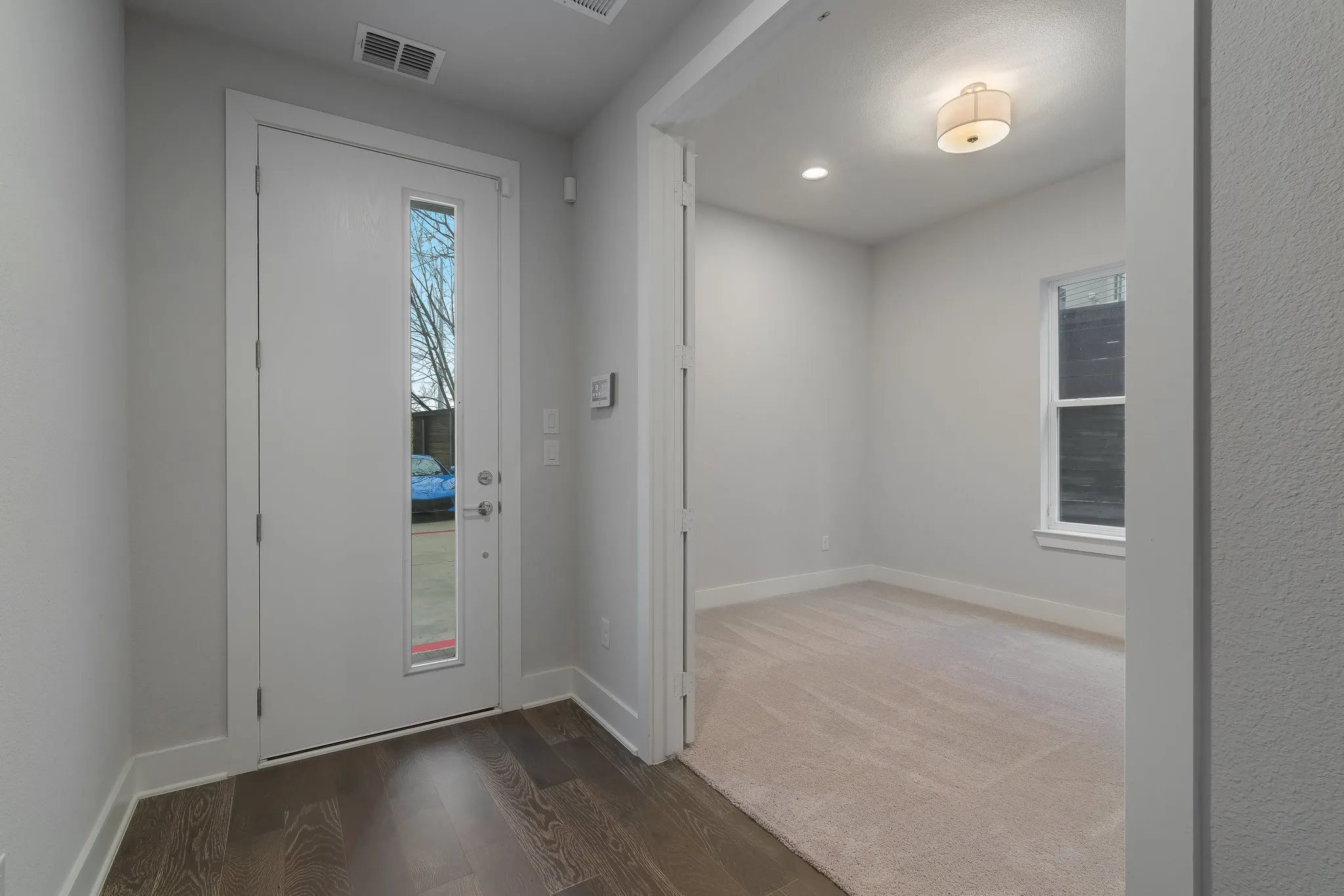 Foyer showing 1st floor bedroom
