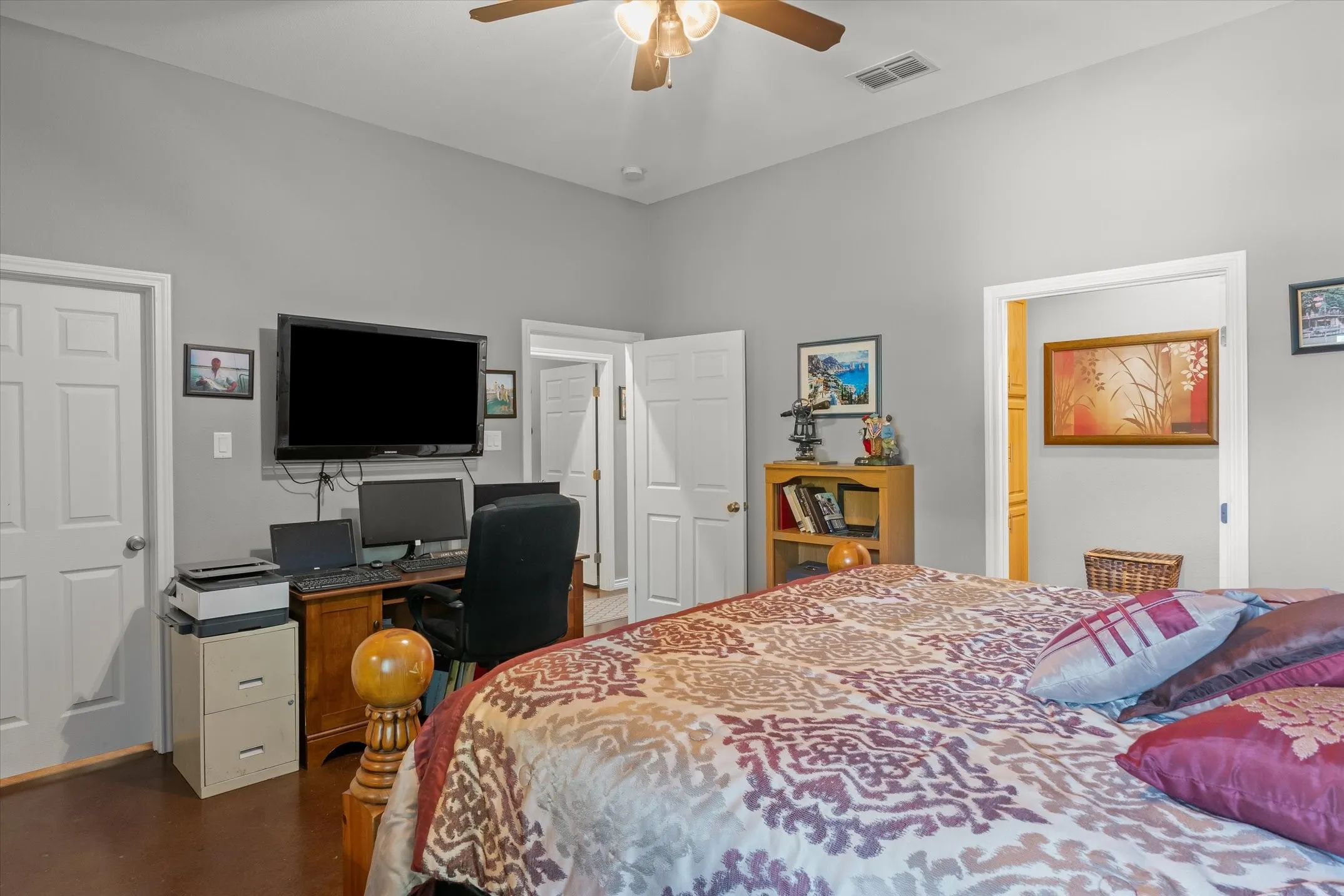 Master suite is large with room for a desk and has a walk in closet
